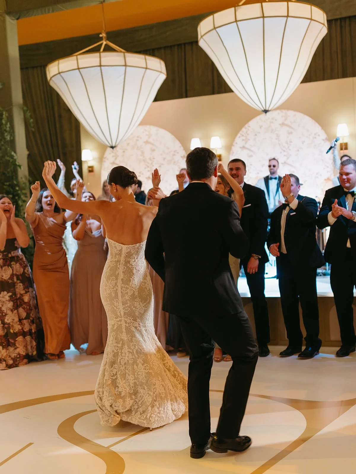 A bride and groom dancing at their wedding reception