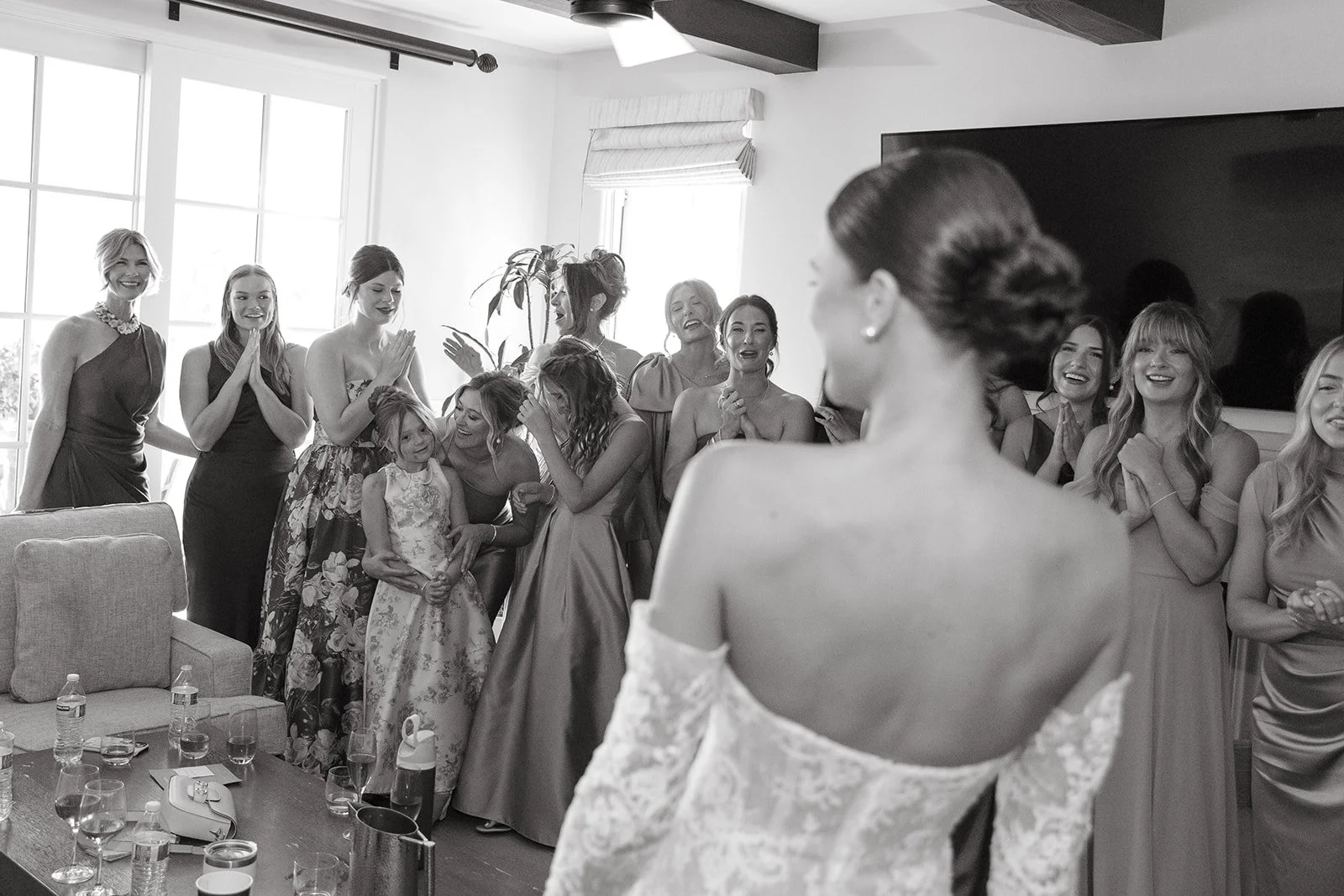 A bride doing a first look with her bridesmaids