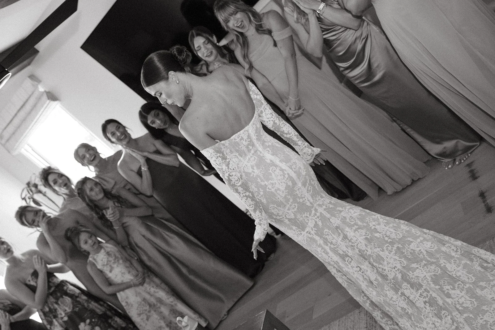 A bride doing a first look with her bridesmaids