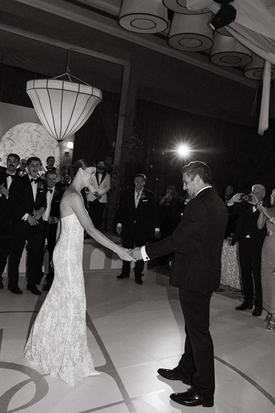 A bride and groom dancing at their wedding reception