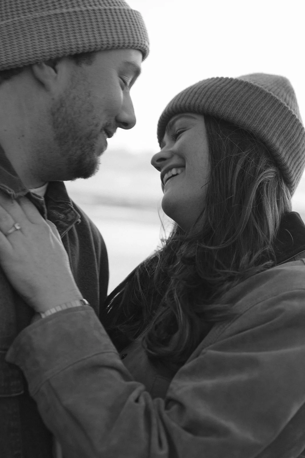 Black and white engagement photos on CAnnon Beach