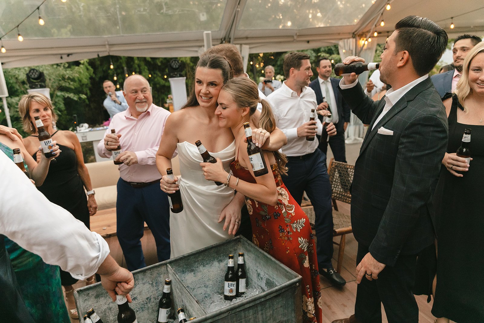 Wedding guests getting beers as memorial ideas for weddings