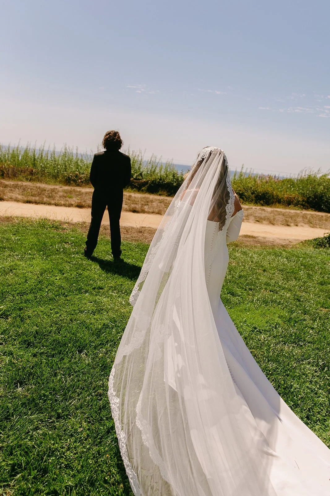 A bride and groom during their first look