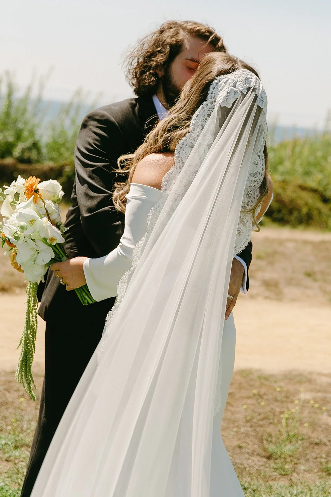 A bride and groom during their first look