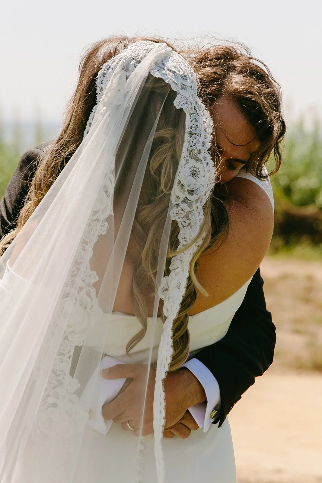 A bride and groom during their first look