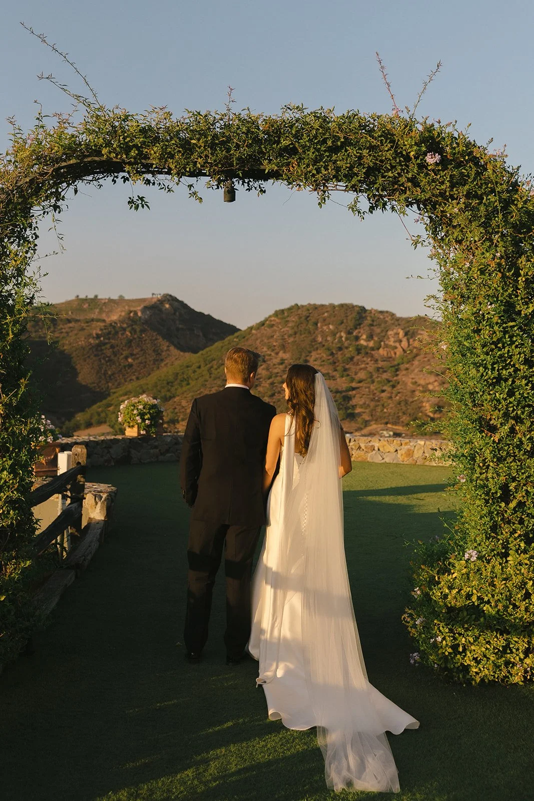 A couple posing for Cielo Farms wedding photos