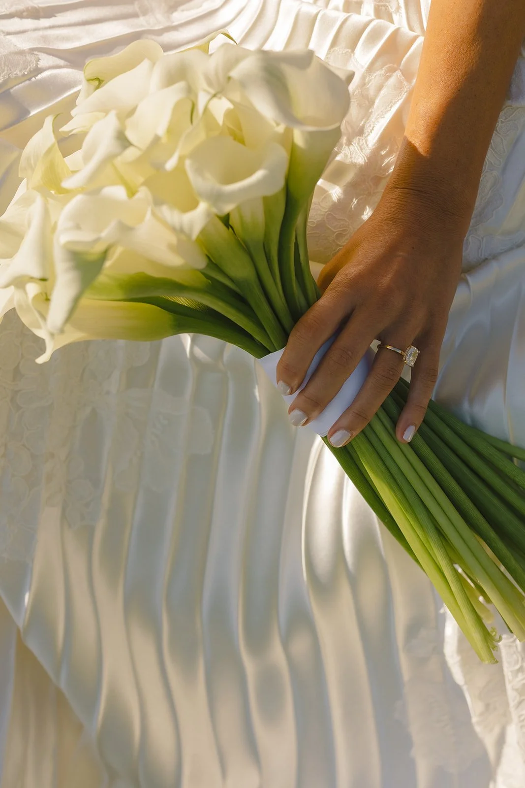 A bride's wedding dress details