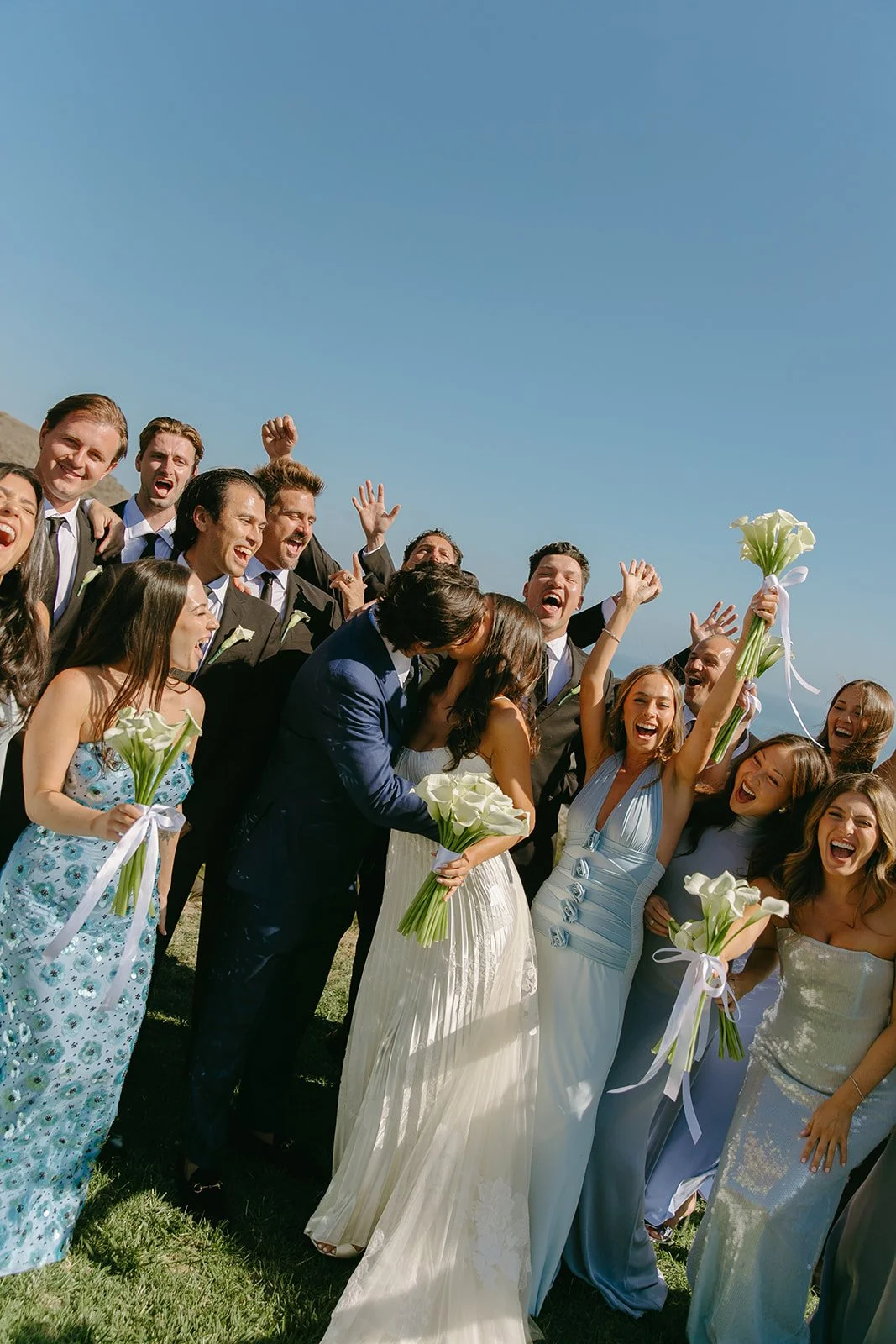 A wedding party taking photos at a malibu sea view estate wedding