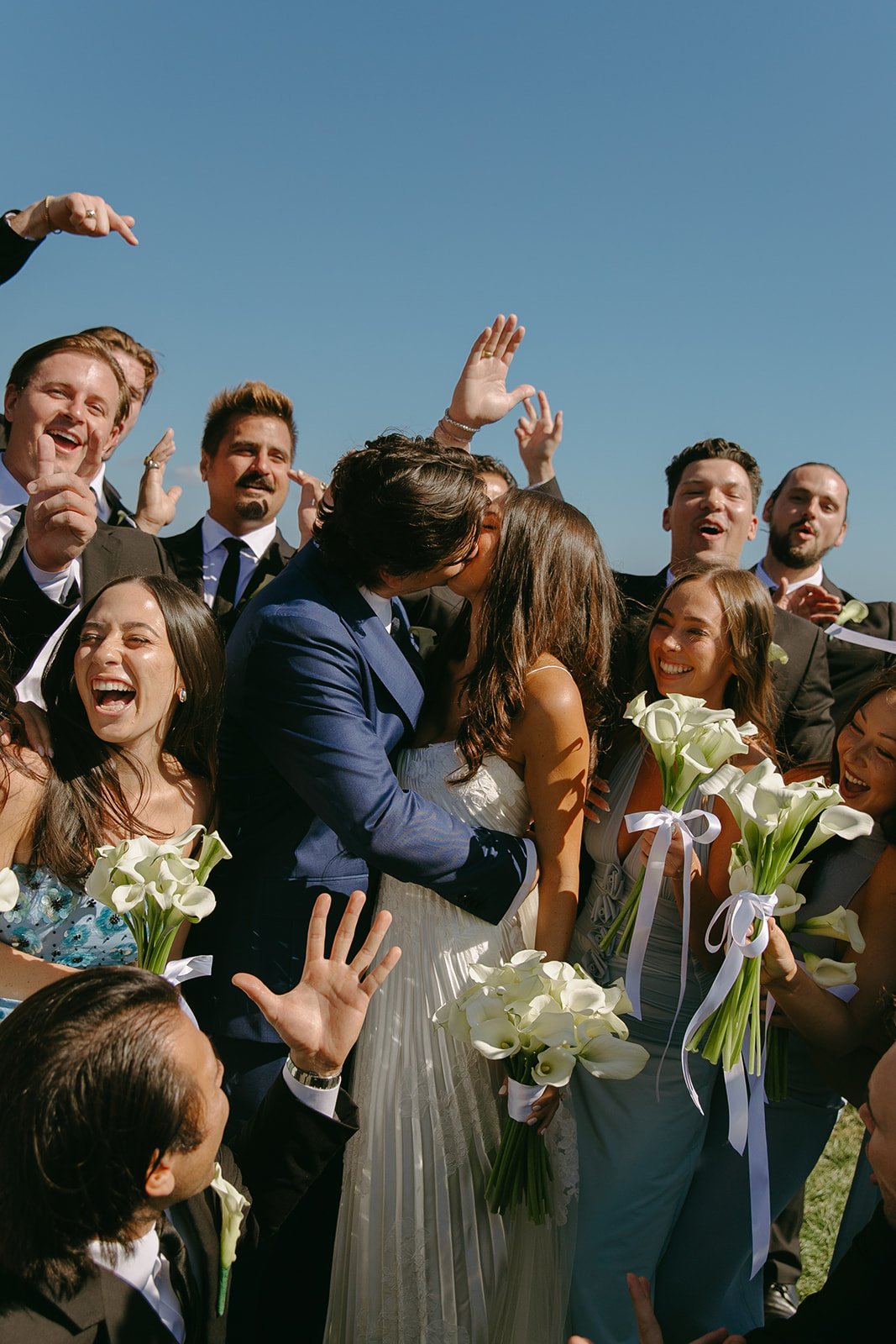 A wedding party taking photos at a malibu sea view estate wedding