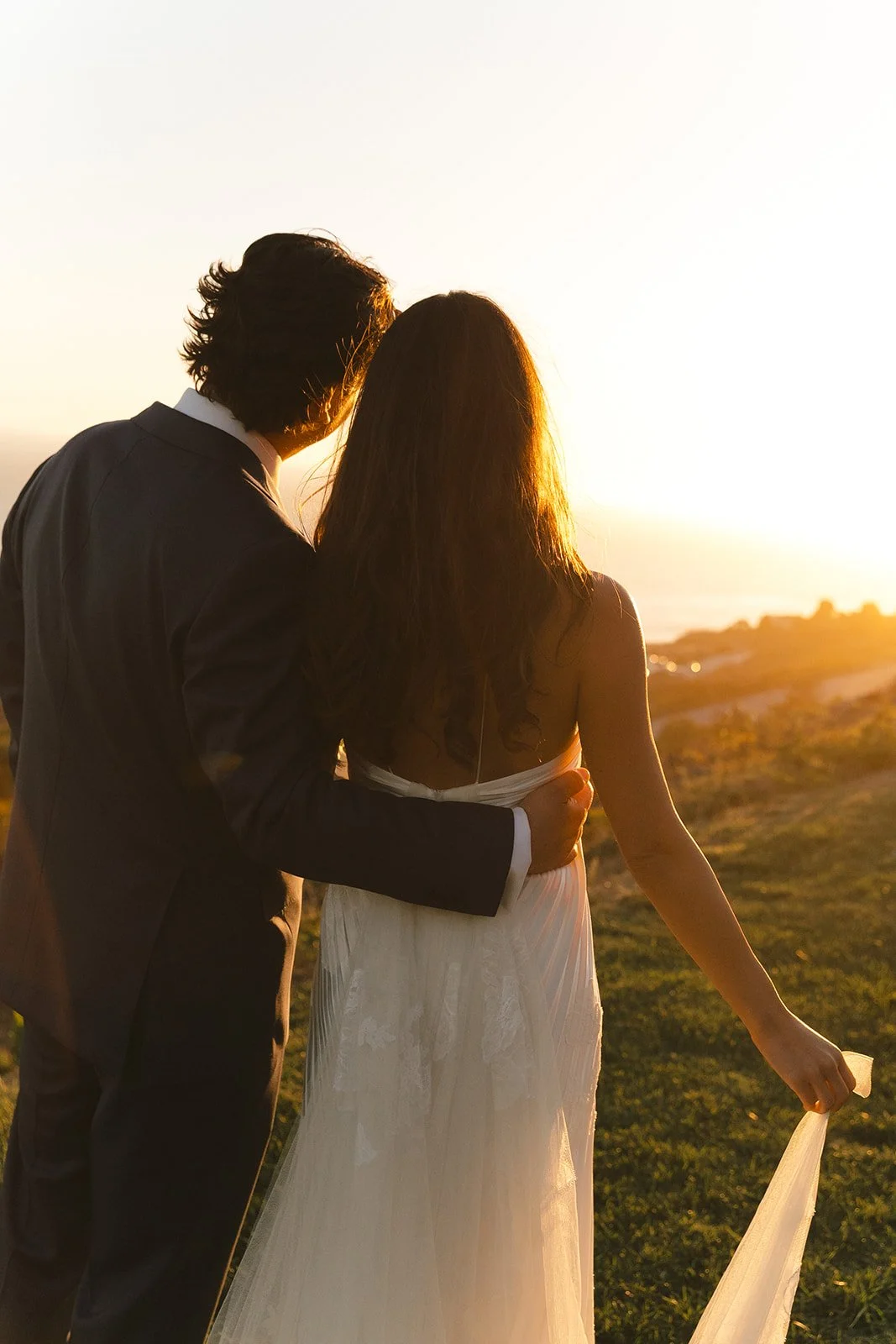 A couple watching the sunset from malibu sea view estate