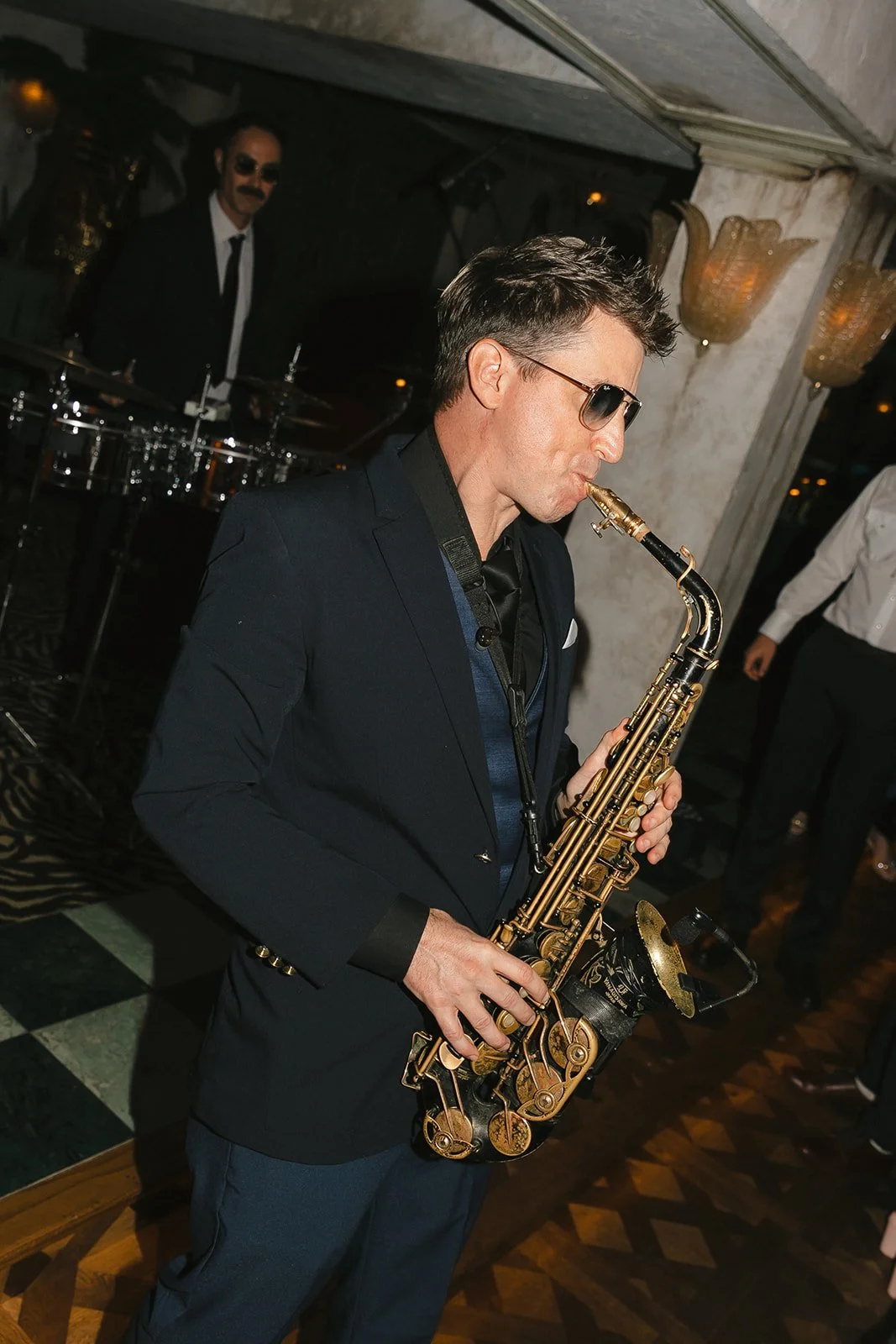 A saxophone player at a Lafayette Hotel wedding
