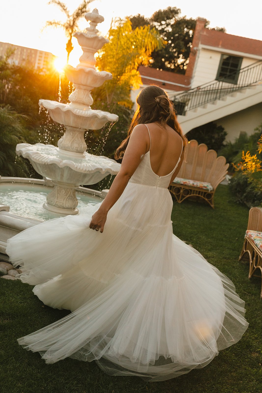 A bride spinning in her wedding dress