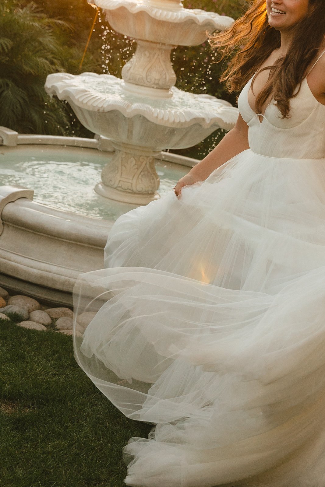 A bride spinning in her wedding dress