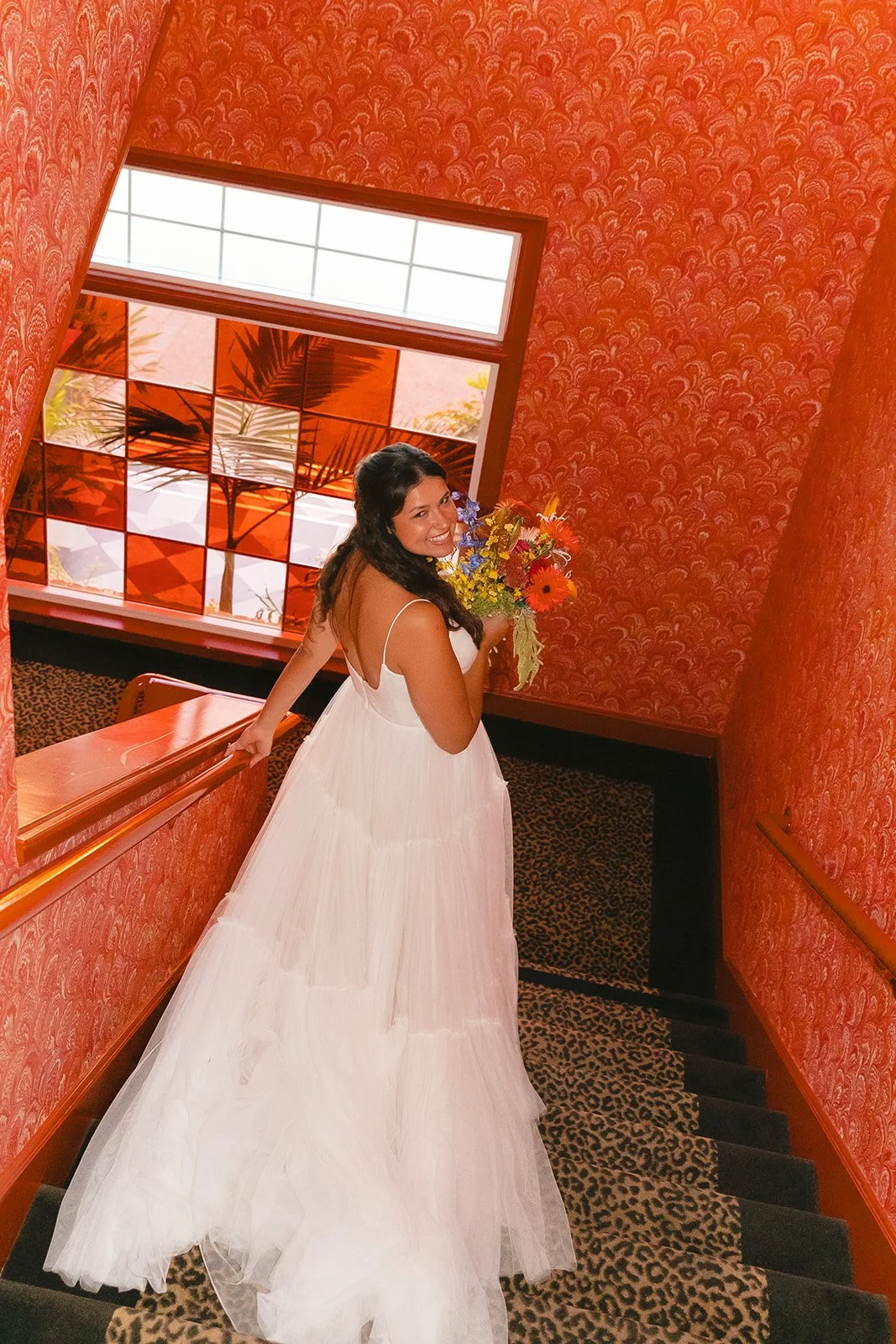 A bride in a hallway at her Lafayette Hotel wedding