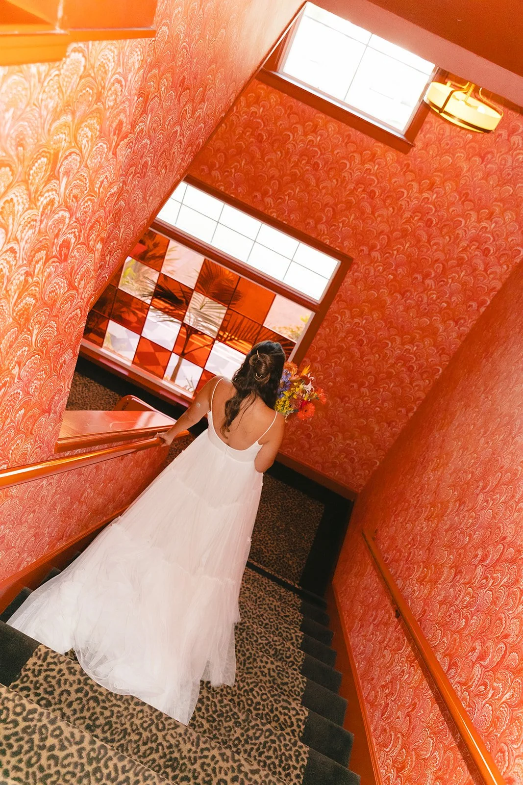 A bride in a hallway at her Lafayette Hotel wedding