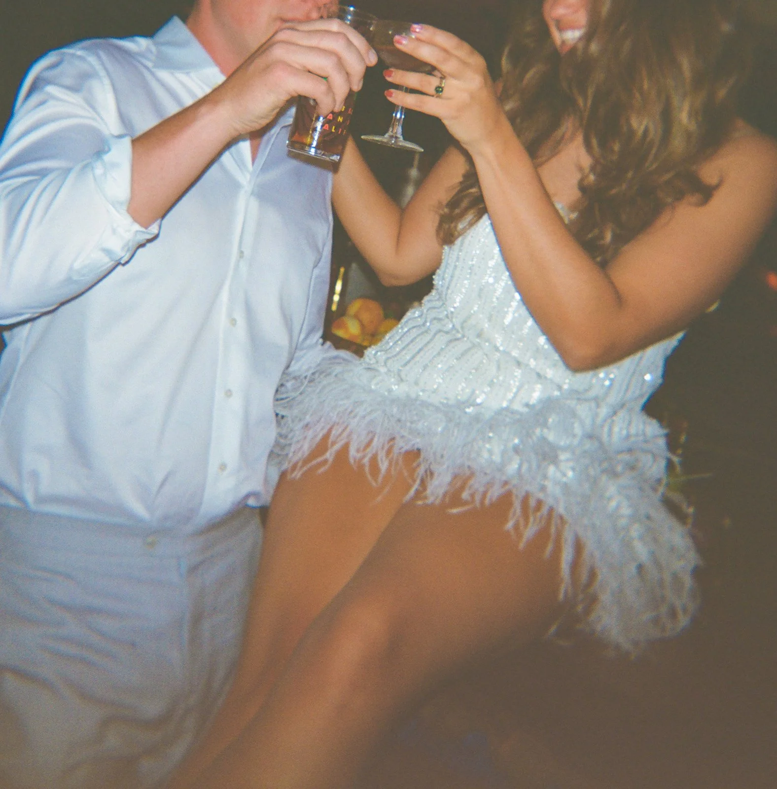 A bride and groom on film at their wedding reception
