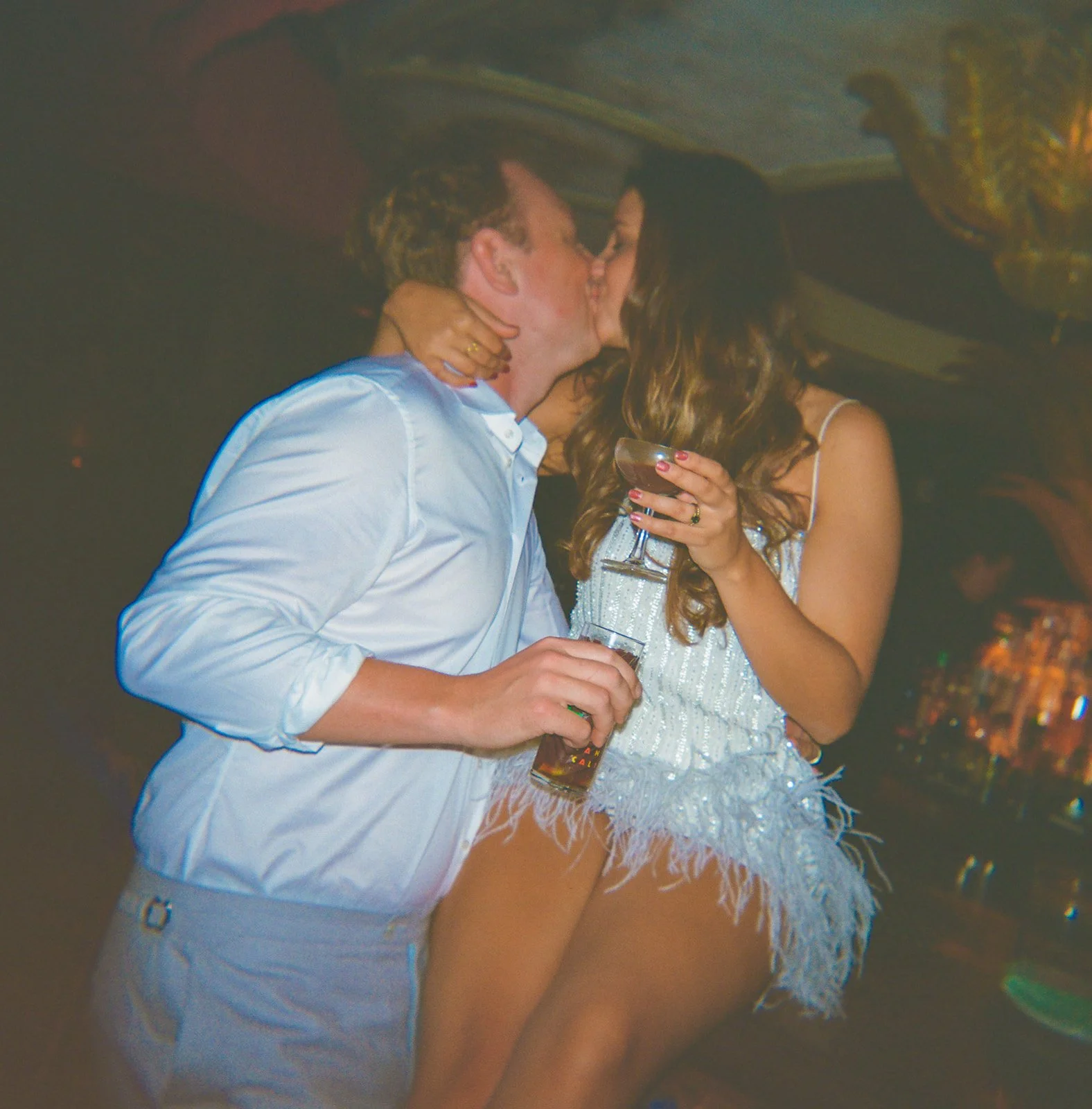 A bride and groom on film at their wedding reception