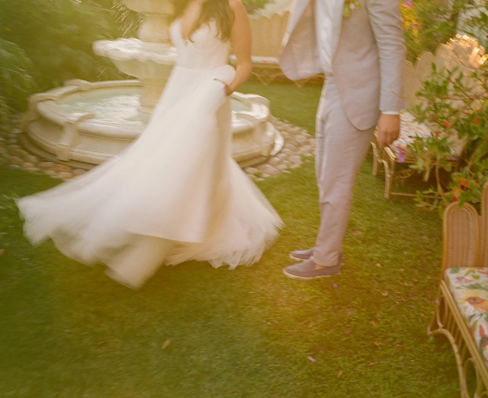 A bride and groom posing for sunset portraits
