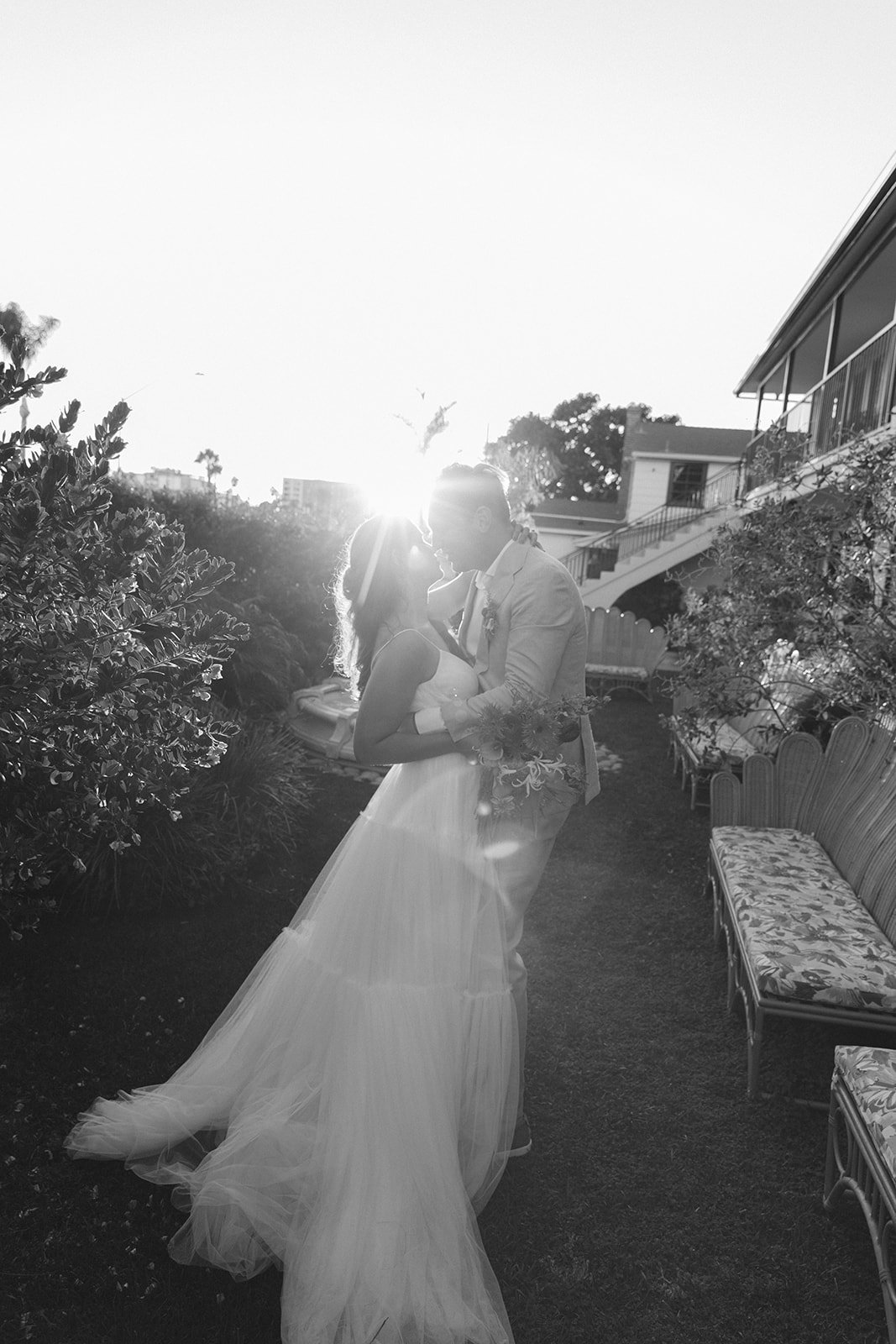 A bride and groom during sunset photos