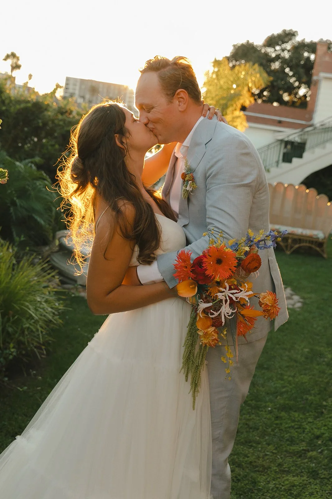 A bride and groom during sunset photos