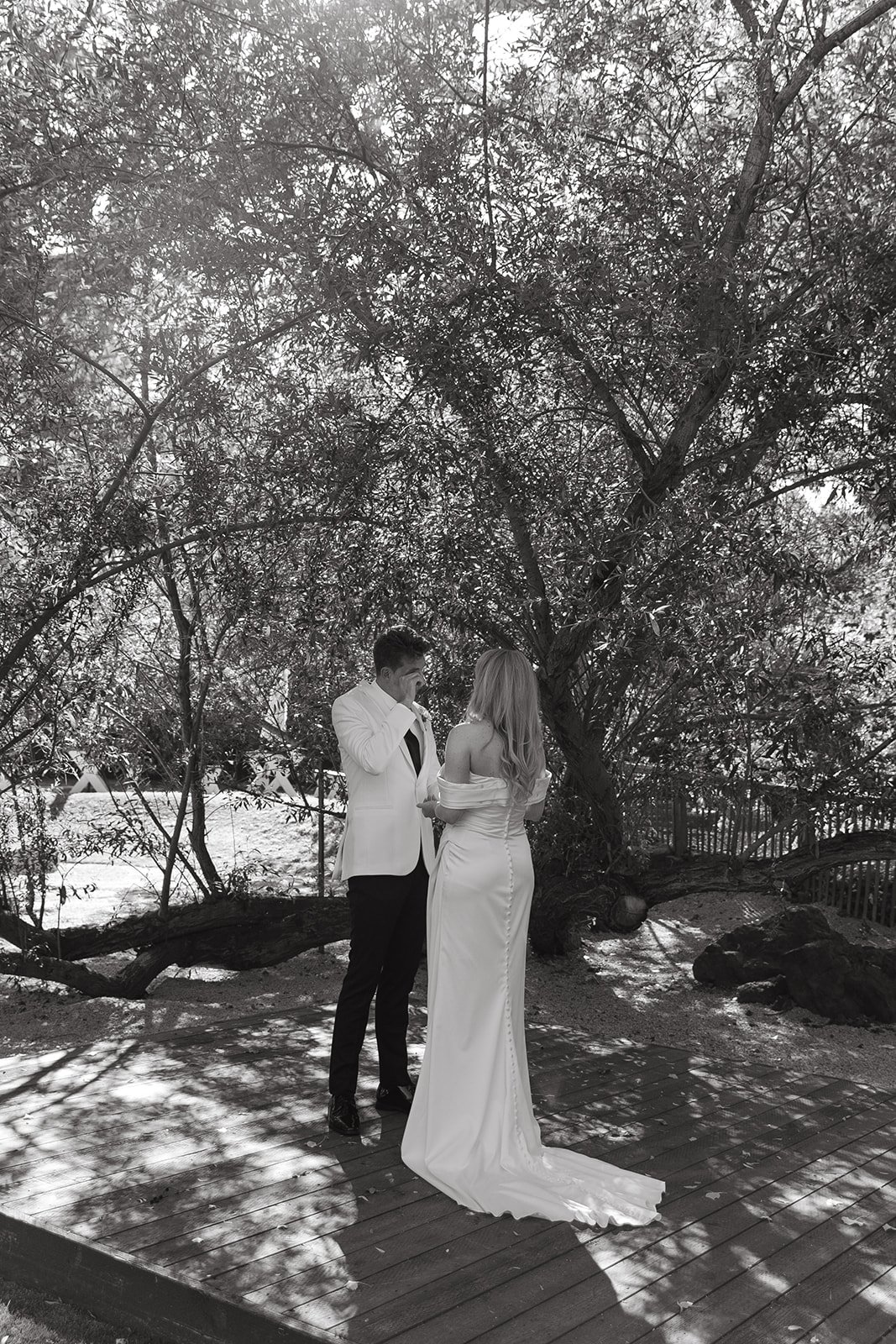 A black and white photo of a bride and groom at their Calamigos Ranch wedding