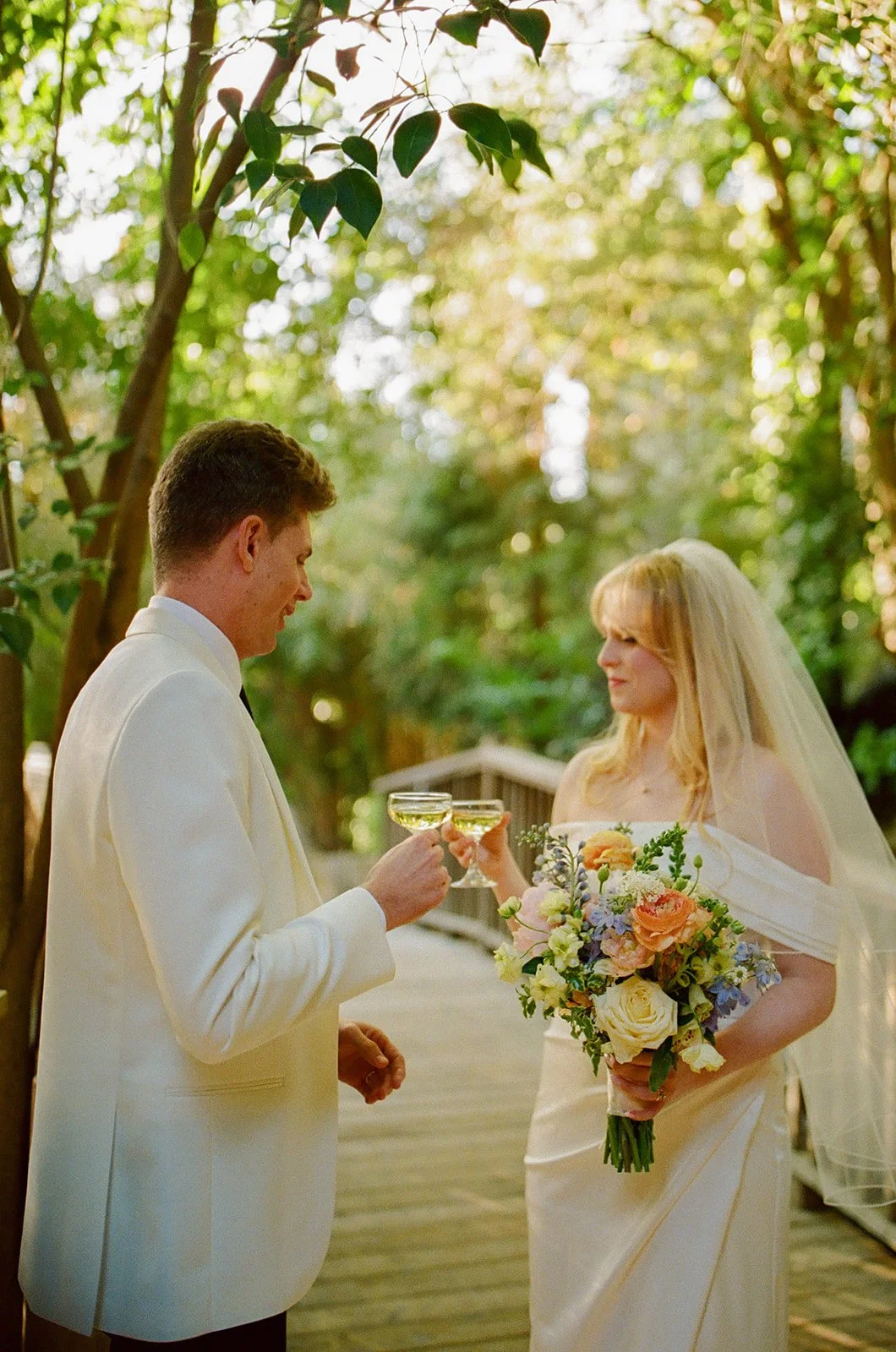 A bride and groom taking portraits at Calamigos RAnch