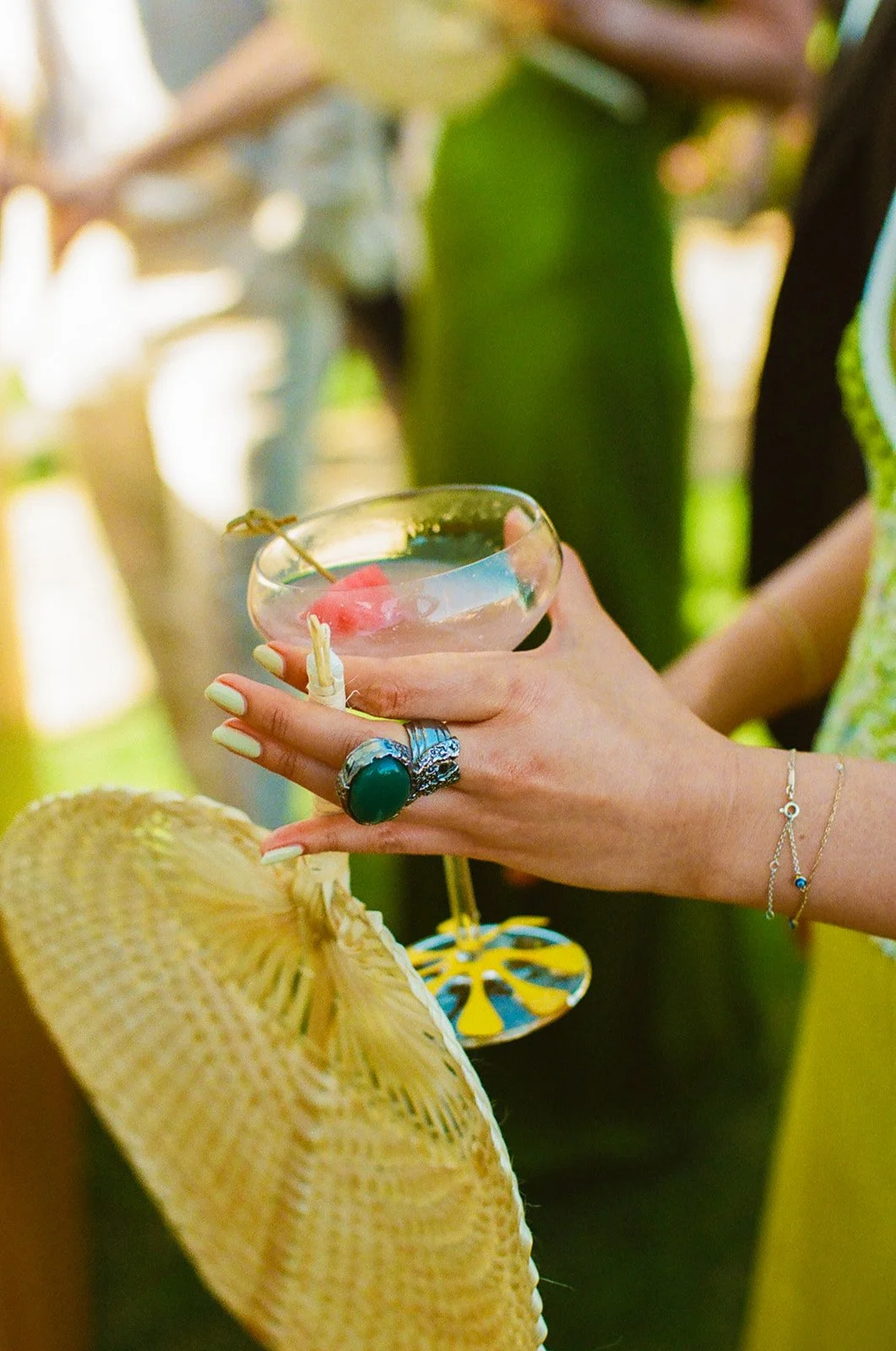 Wedding guests holding a cocktail at Adamson House