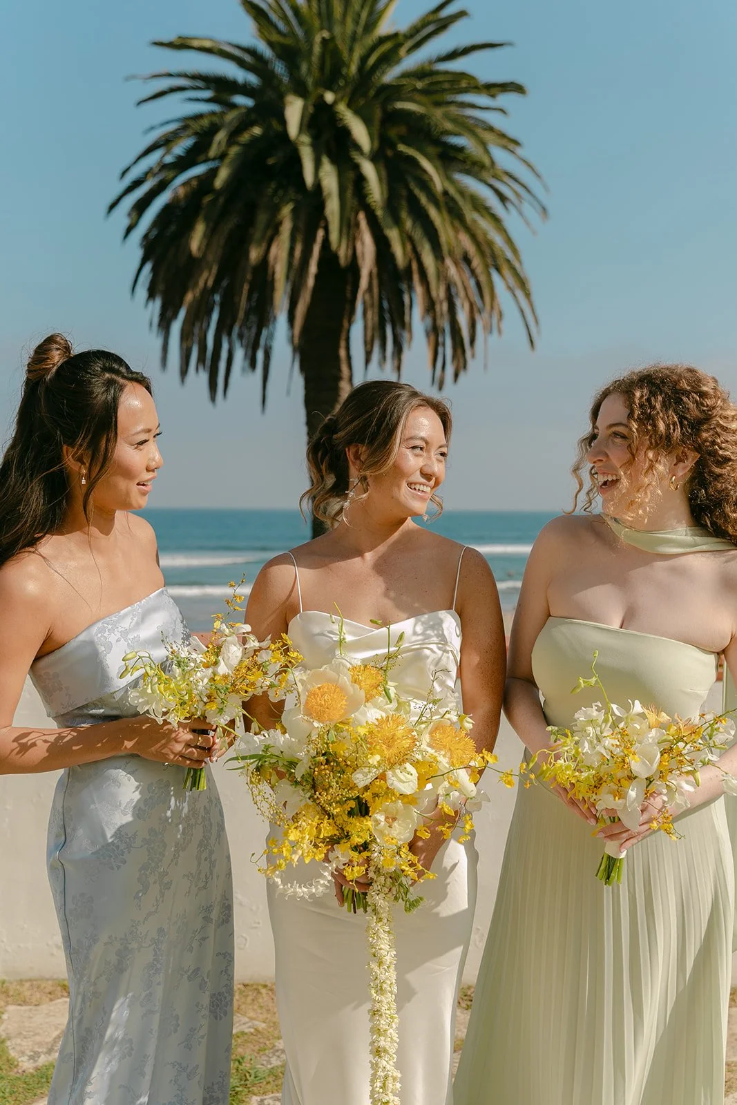 A bride posing with bridesmaids