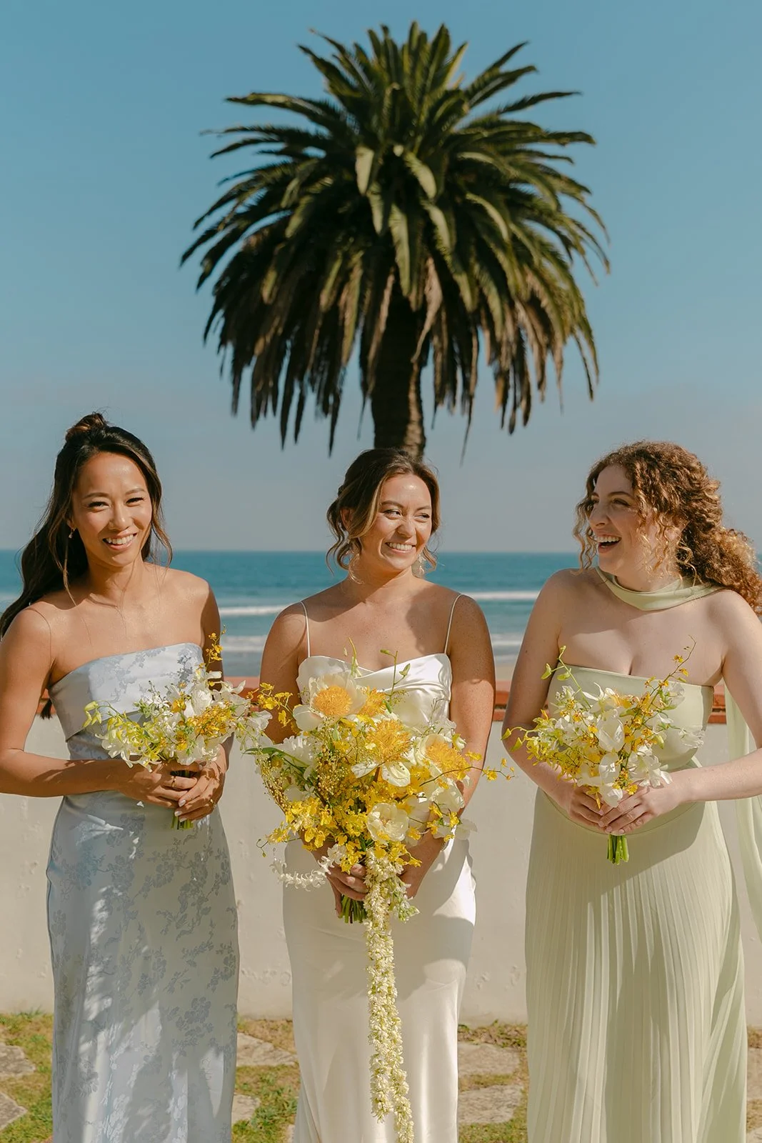 A bride posing with bridesmaids
