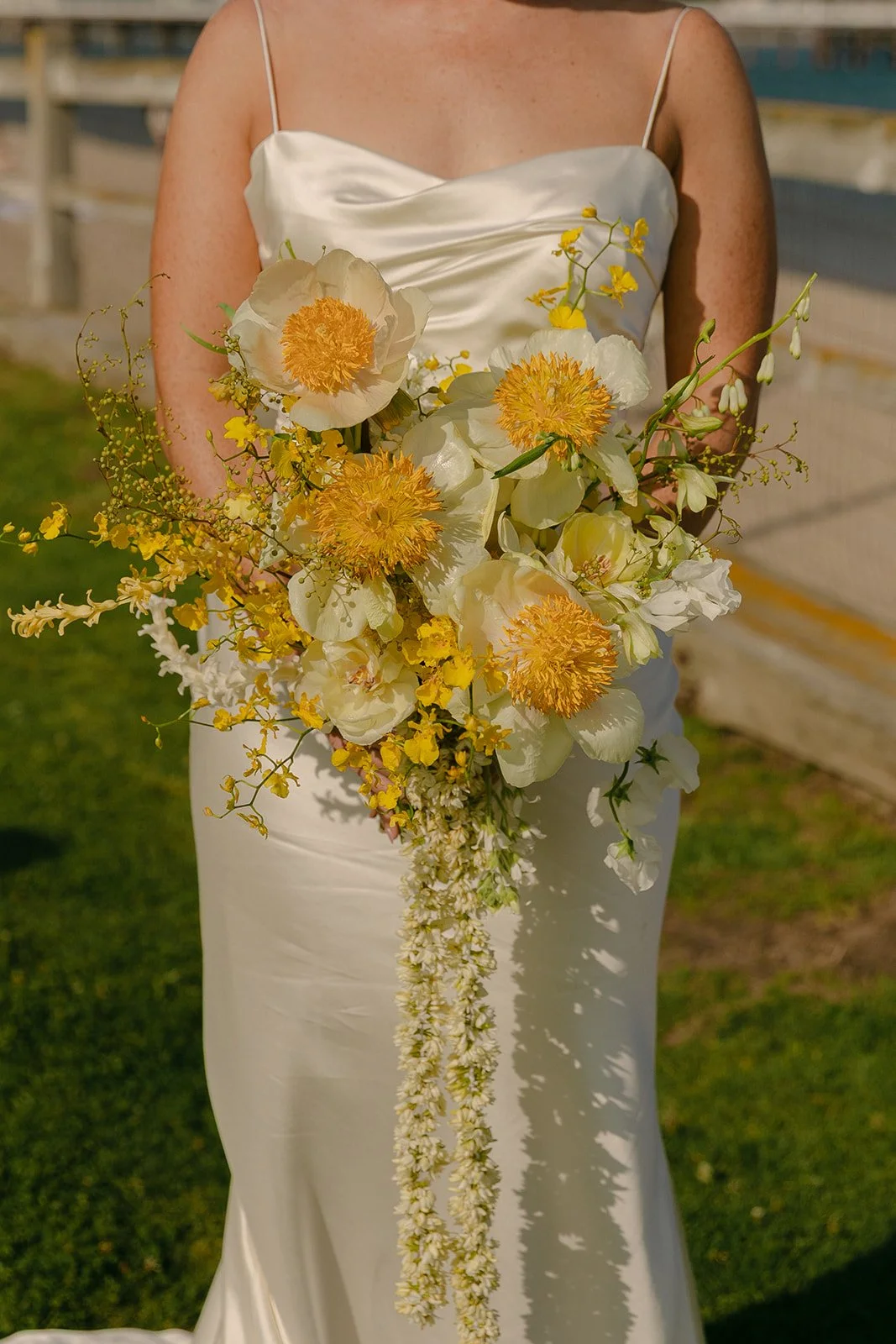 Yellow wedding flowers at a summer wedding
