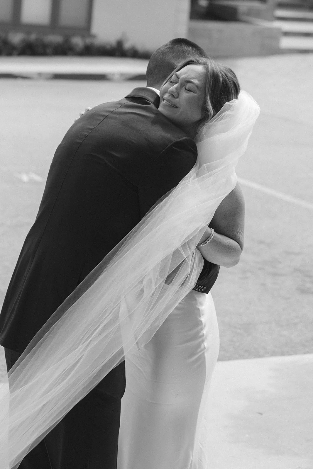 A bride crying after her wedding ceremony