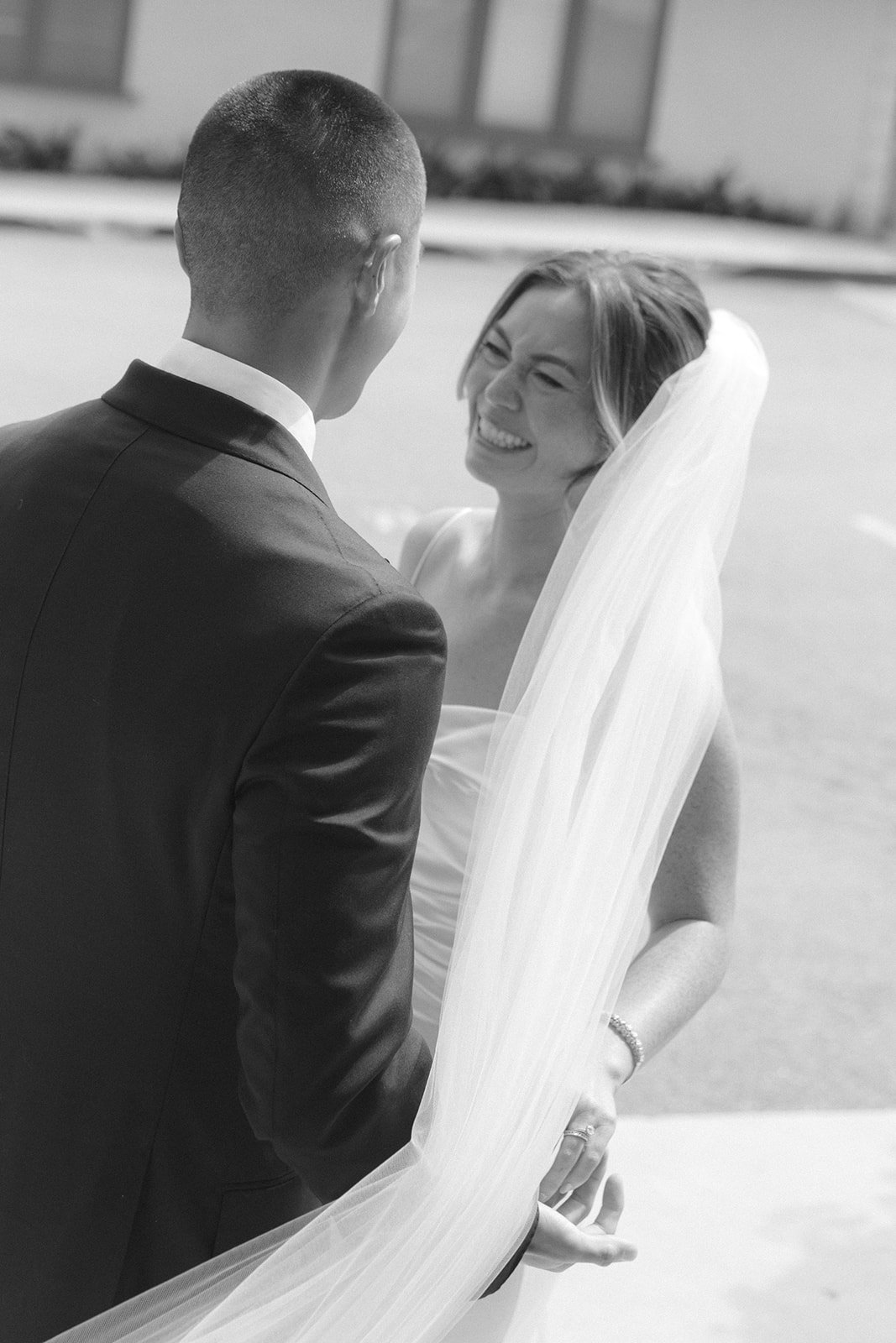 A bride crying after her wedding ceremony