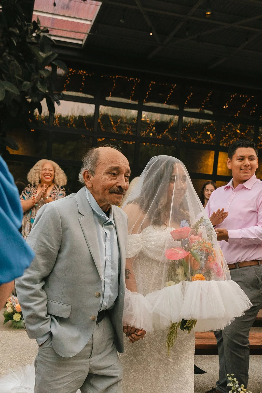 A bride walking down the aisle