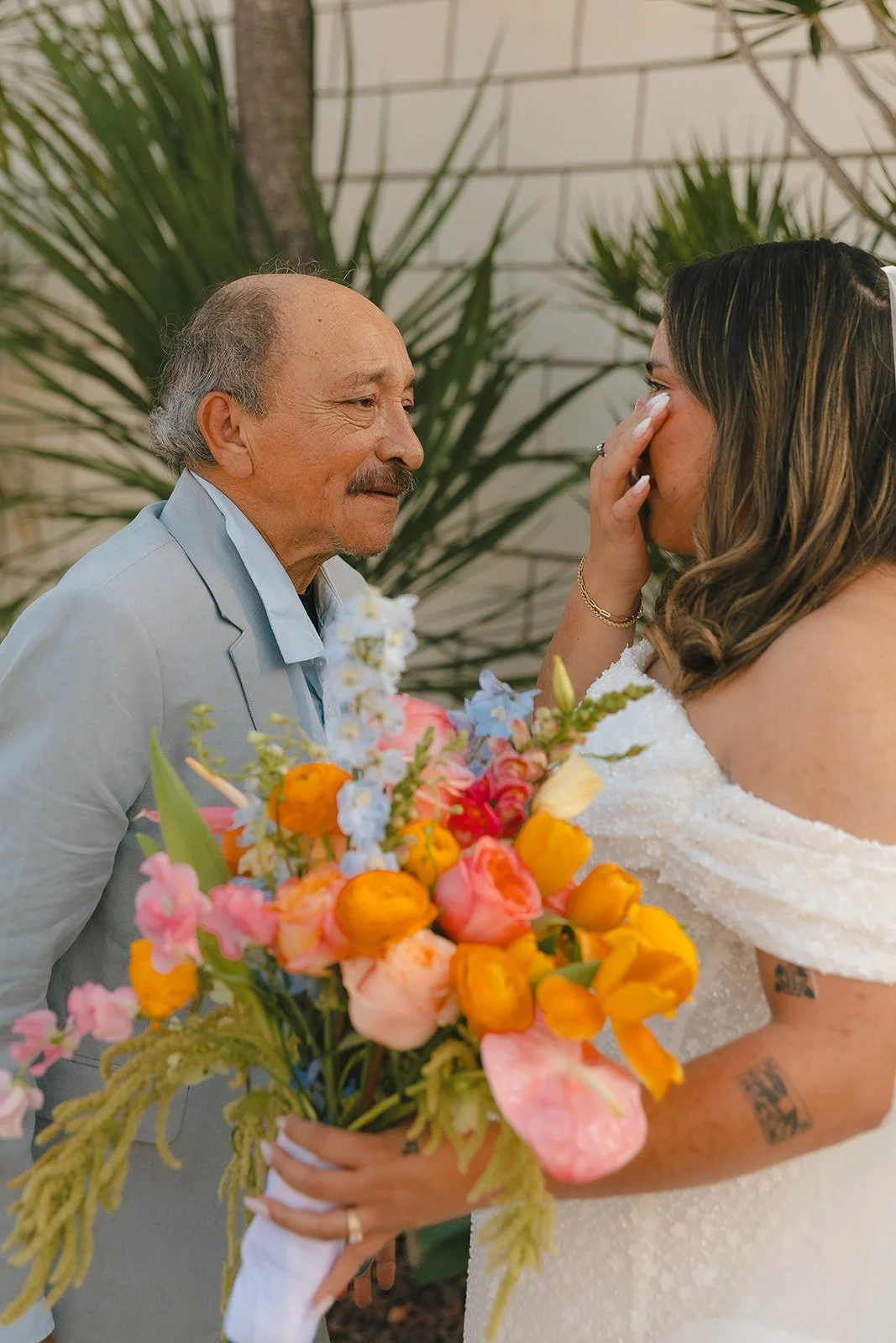 A bride and father wedding first look