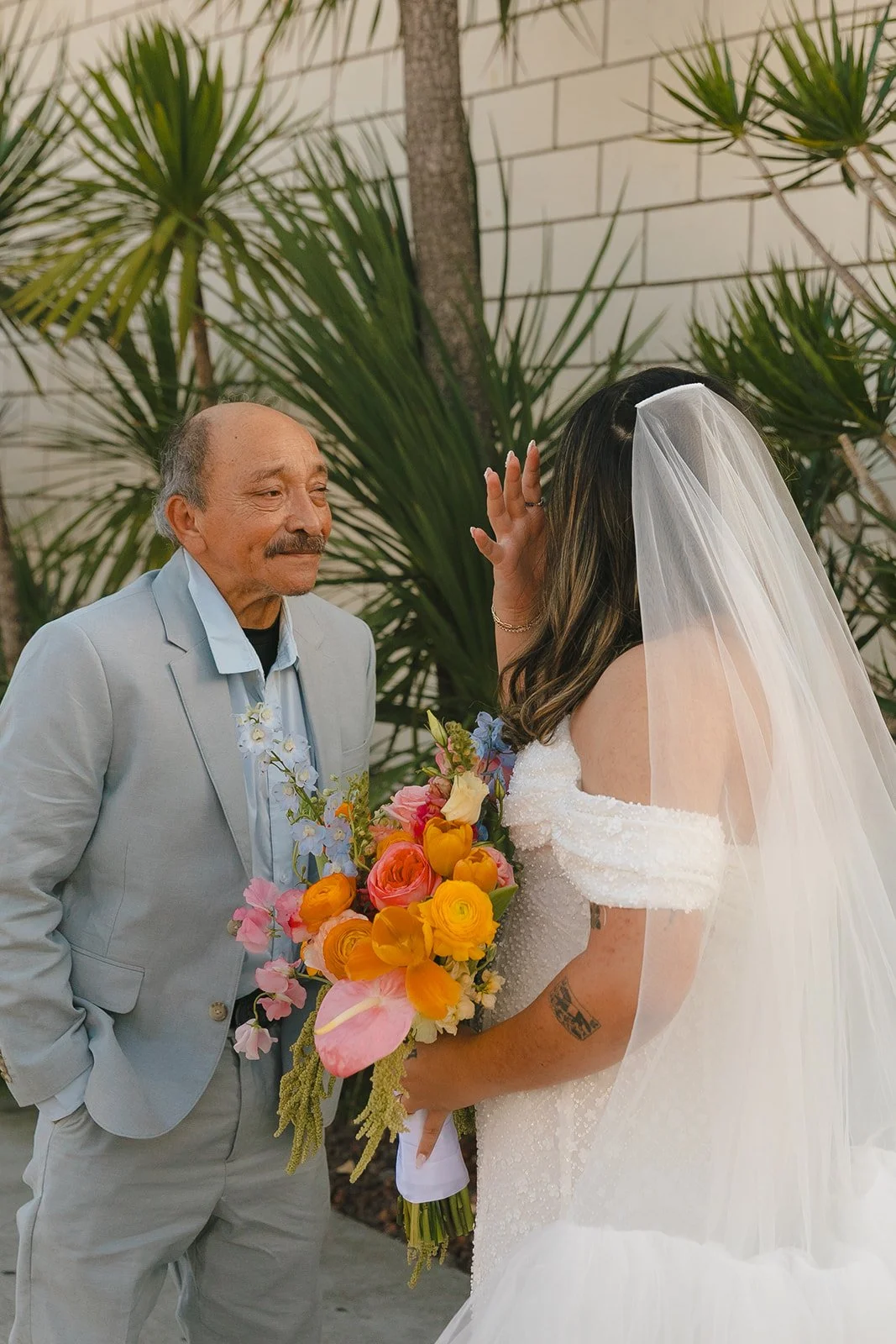 A bride and father wedding first look