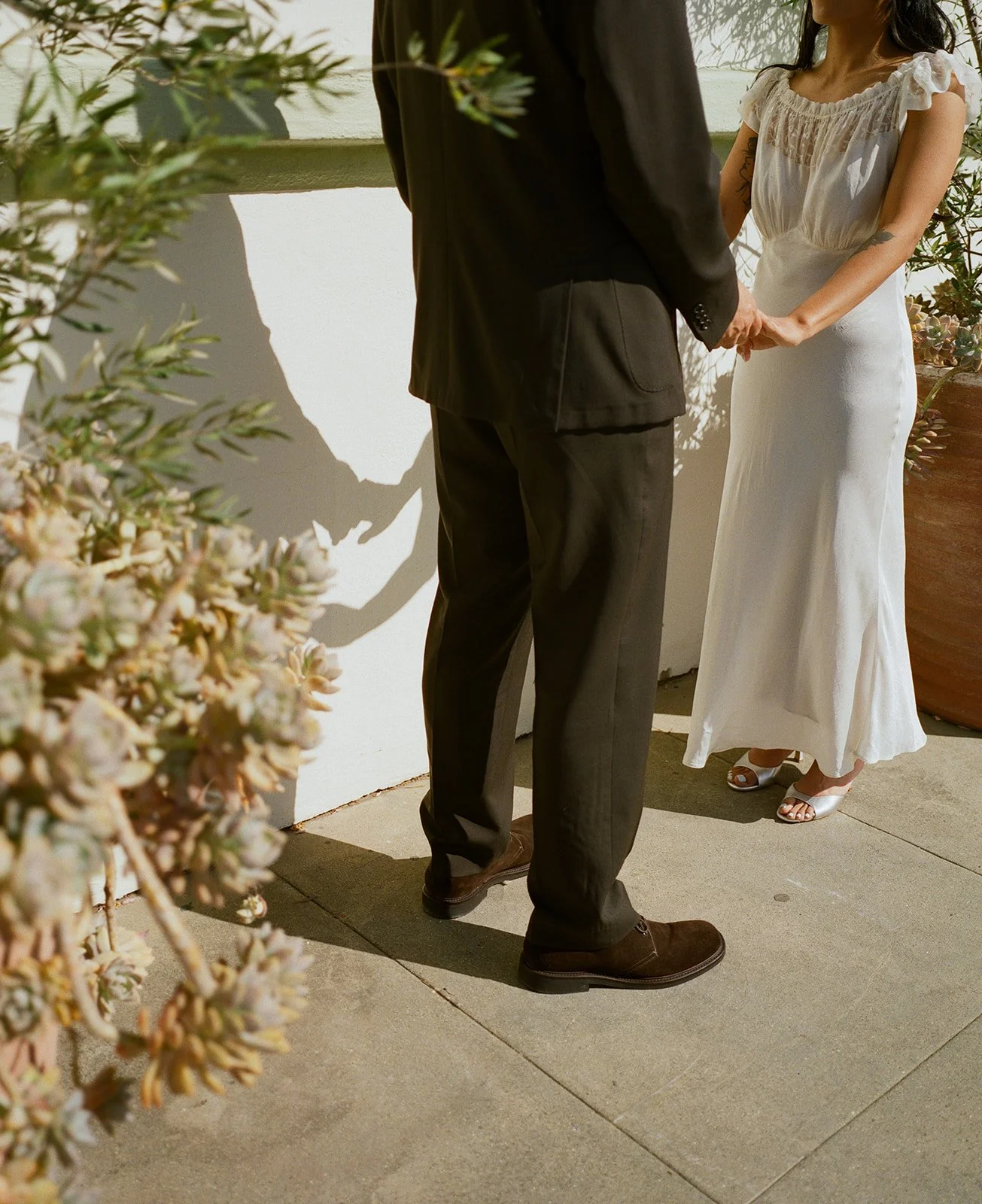 A bride and groom at their dinner wedding reception