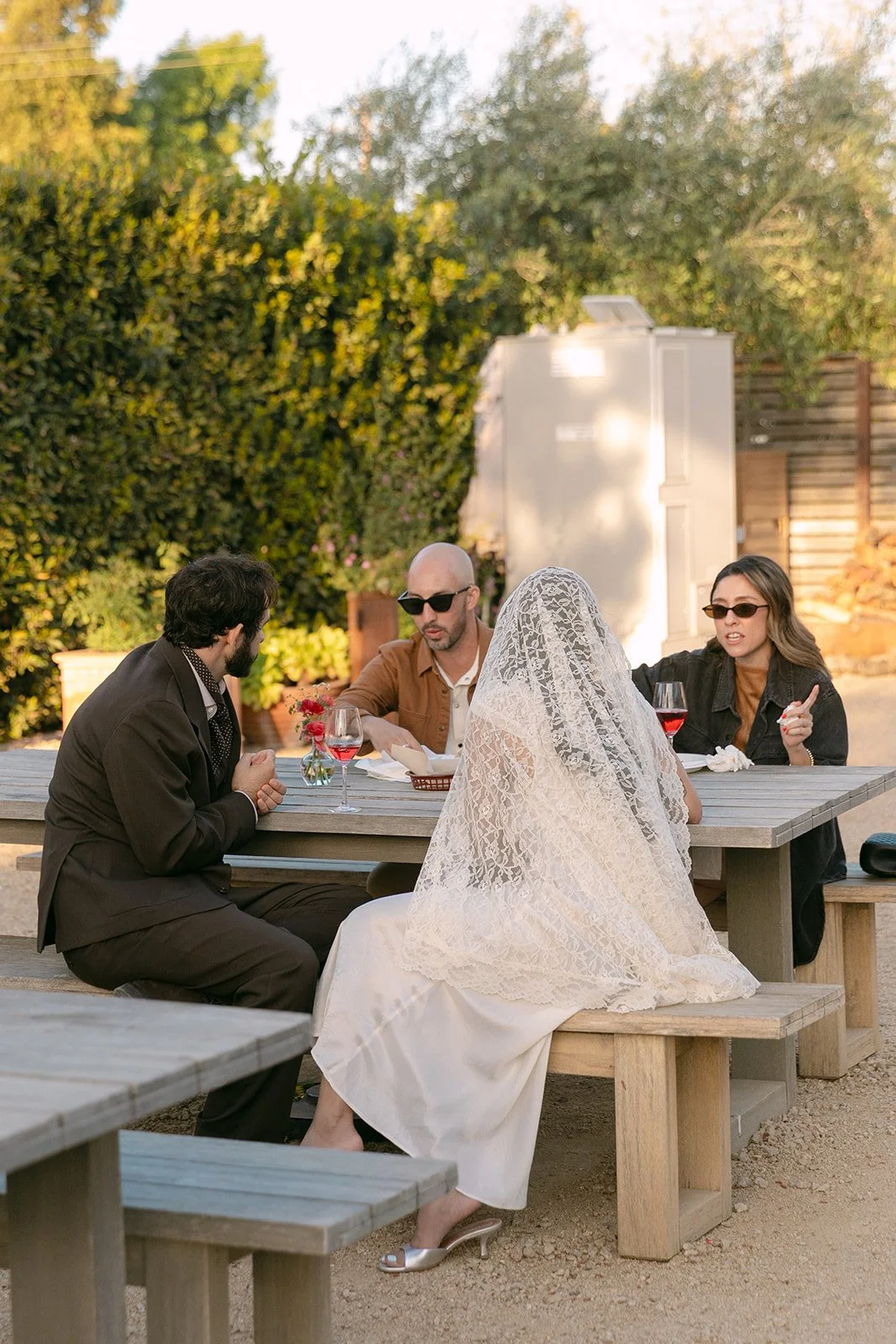 Guests enjoying a dinner party wedding