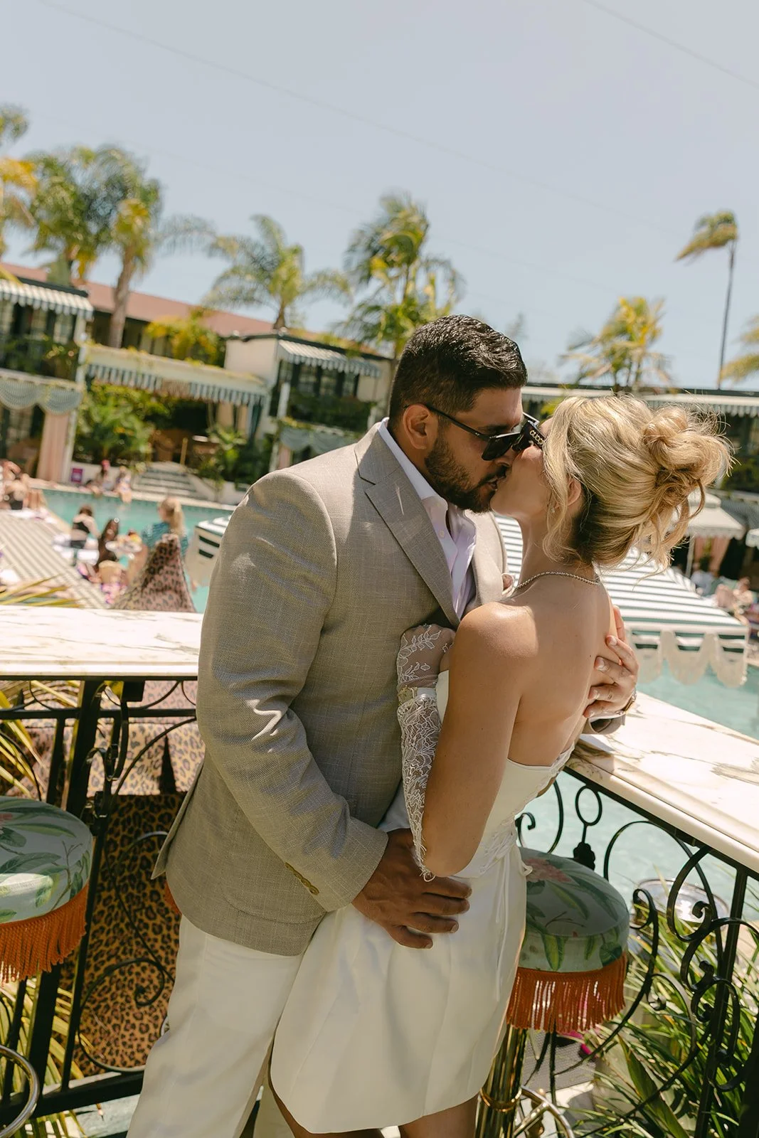 A couple by the pool at Lafayette Hotel