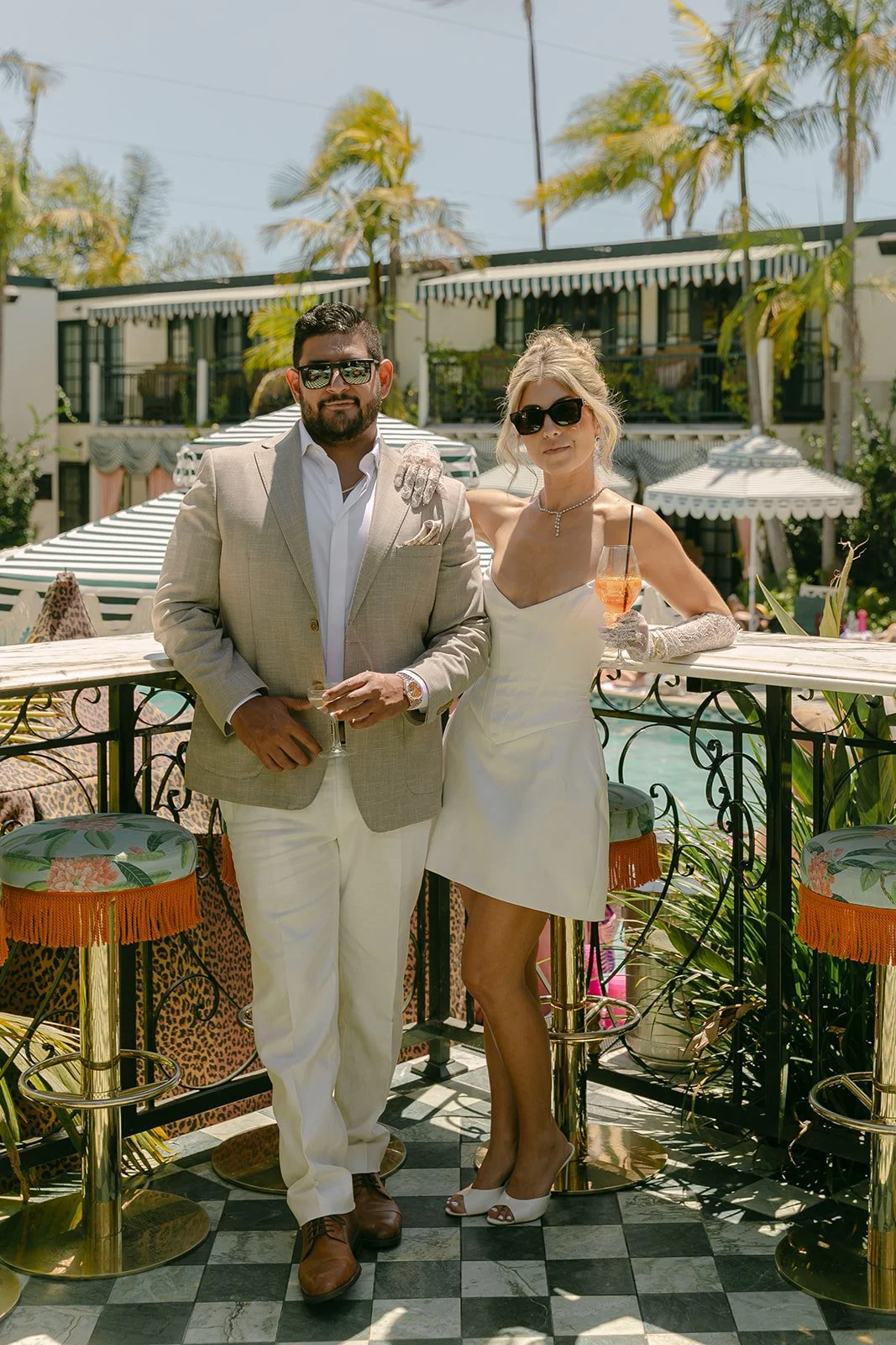 A couple by the pool at Lafayette Hotel