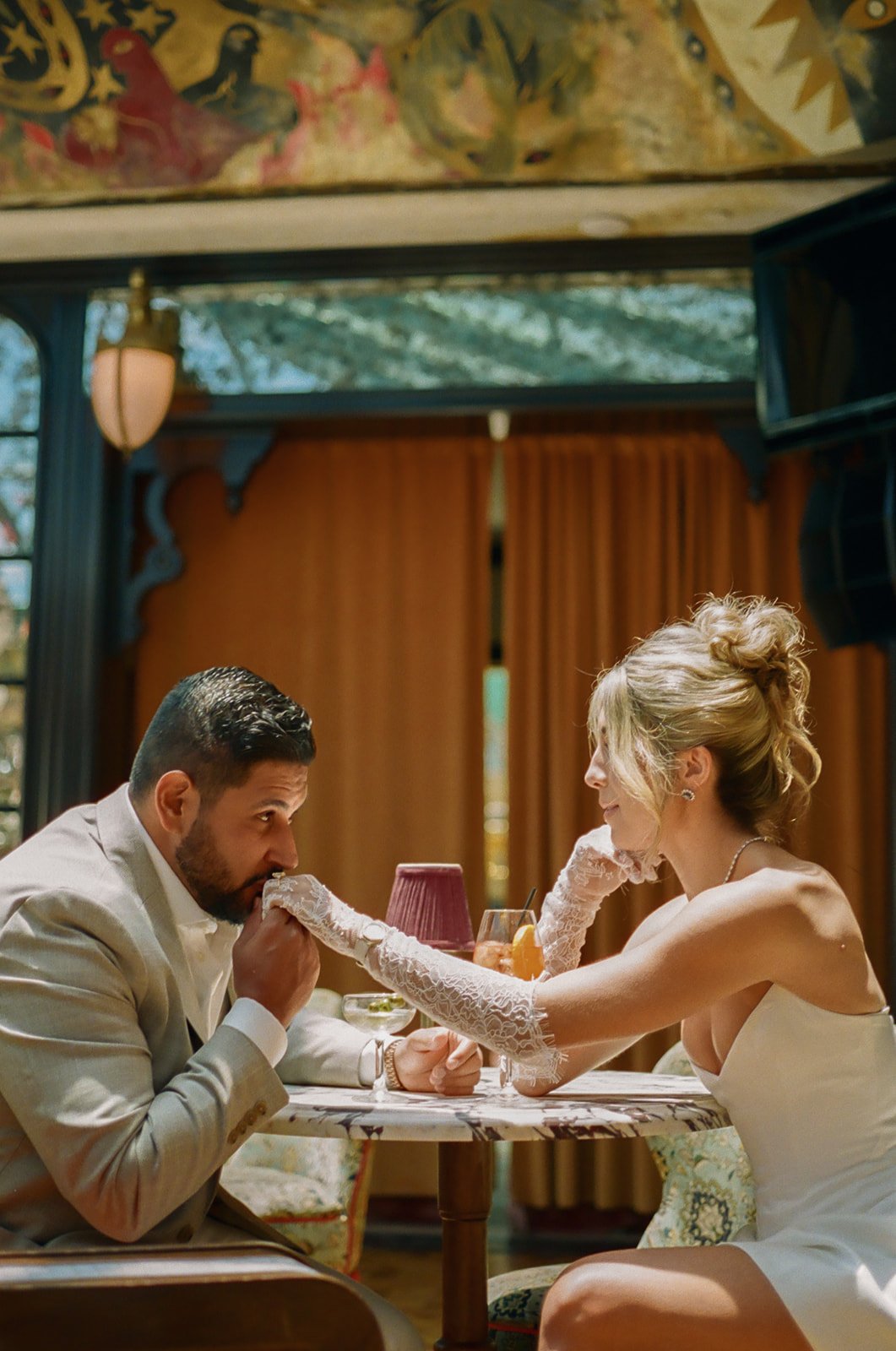 A couple taking unique Lafayette Hotel engagement photos