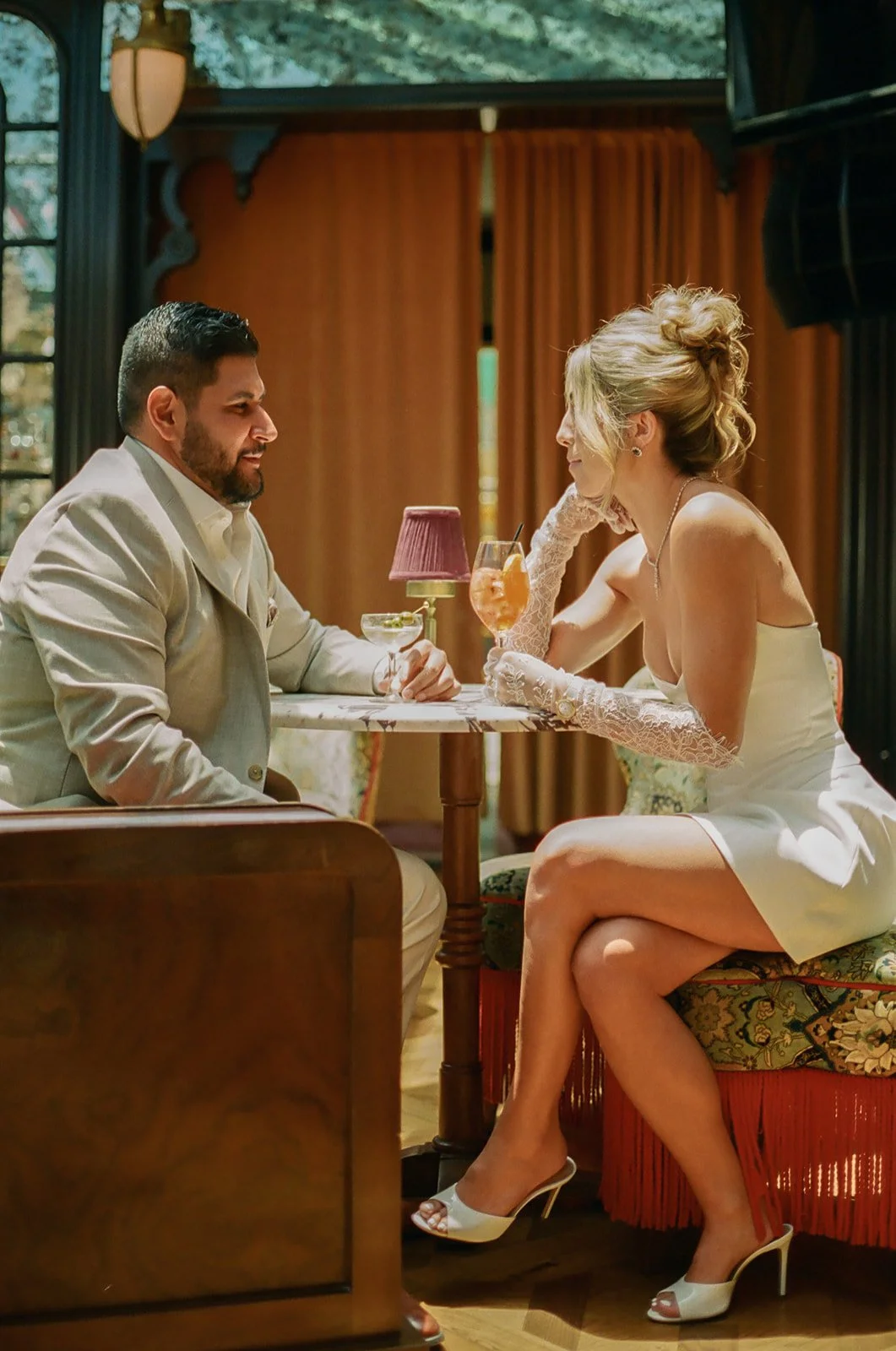 A couple taking unique Lafayette Hotel engagement photos