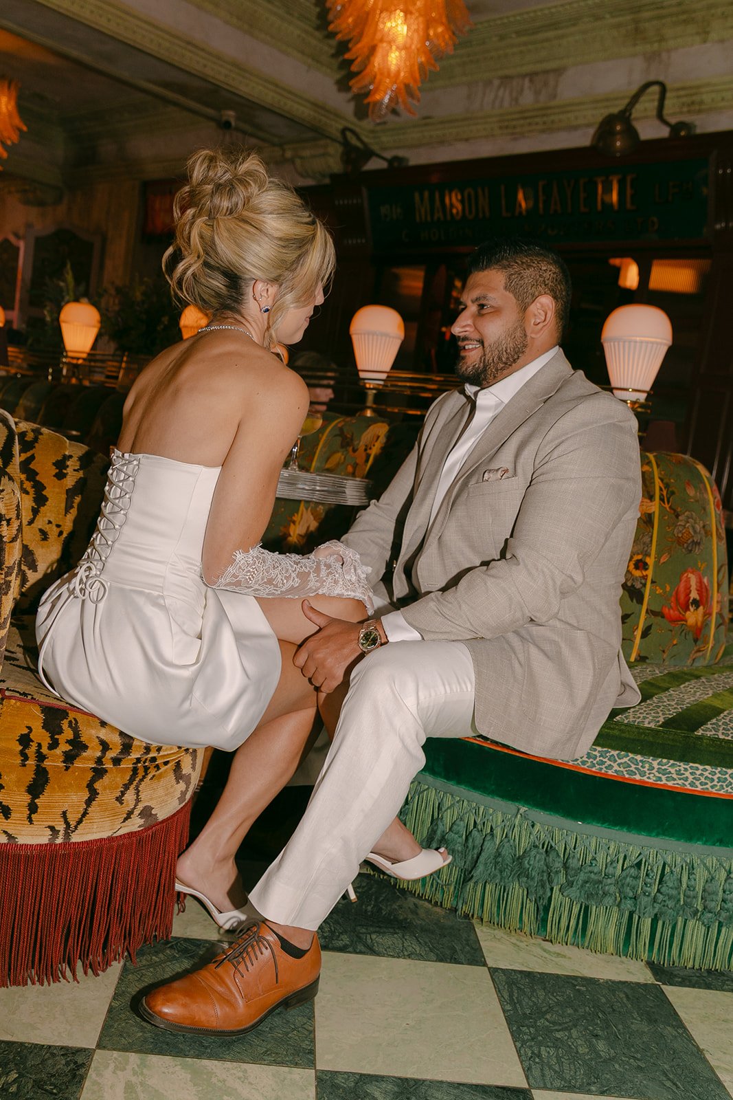 A couple in the lounge at Lafayette Hotel for engagement photos