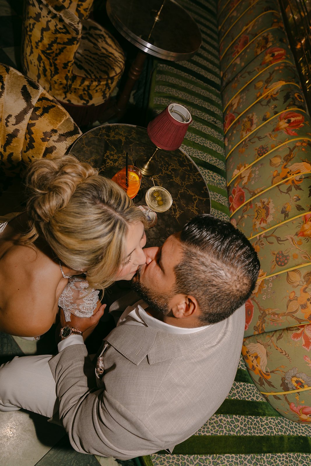 A couple in the lounge at Lafayette Hotel for engagement photos