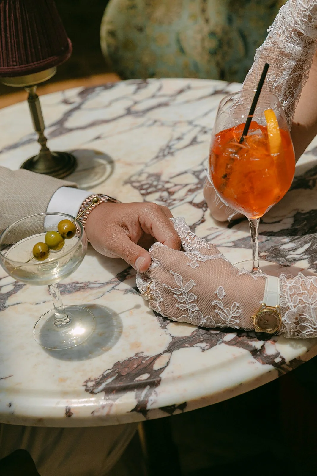 Close up engagement photos showing off a couple's outfits
