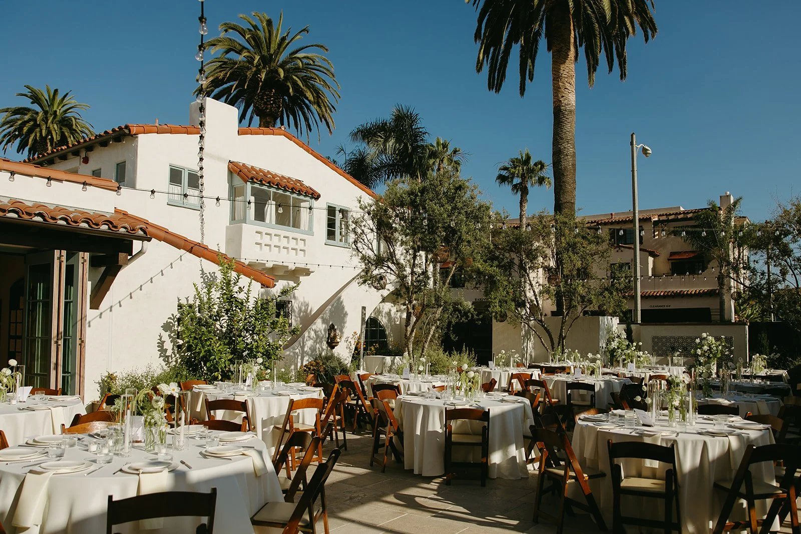A wedding reception setup at Agape 1928, a San Clemente wedding venue