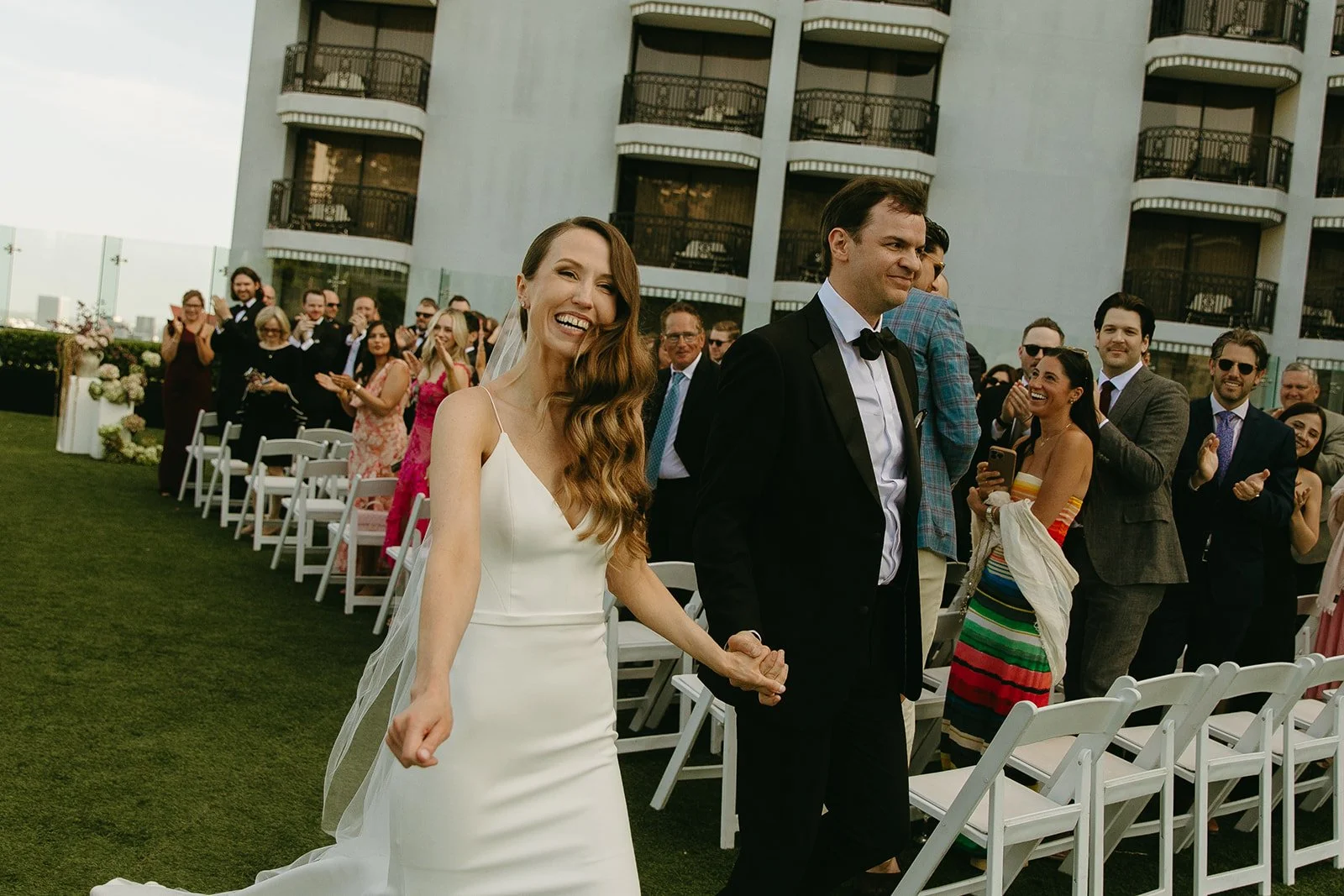 A couple celebrating after their wedding ceremony