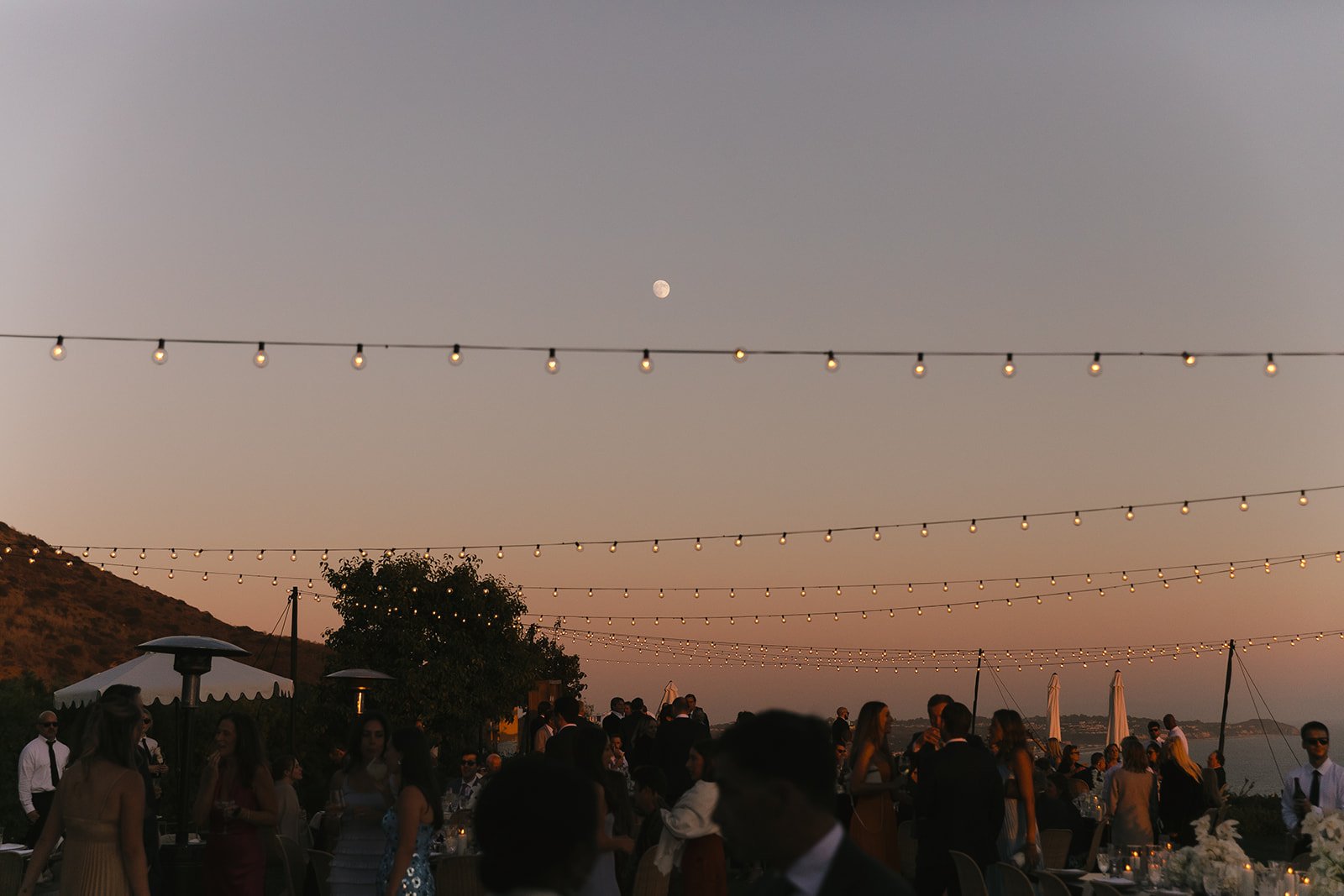 An outdoor summer wedding reception