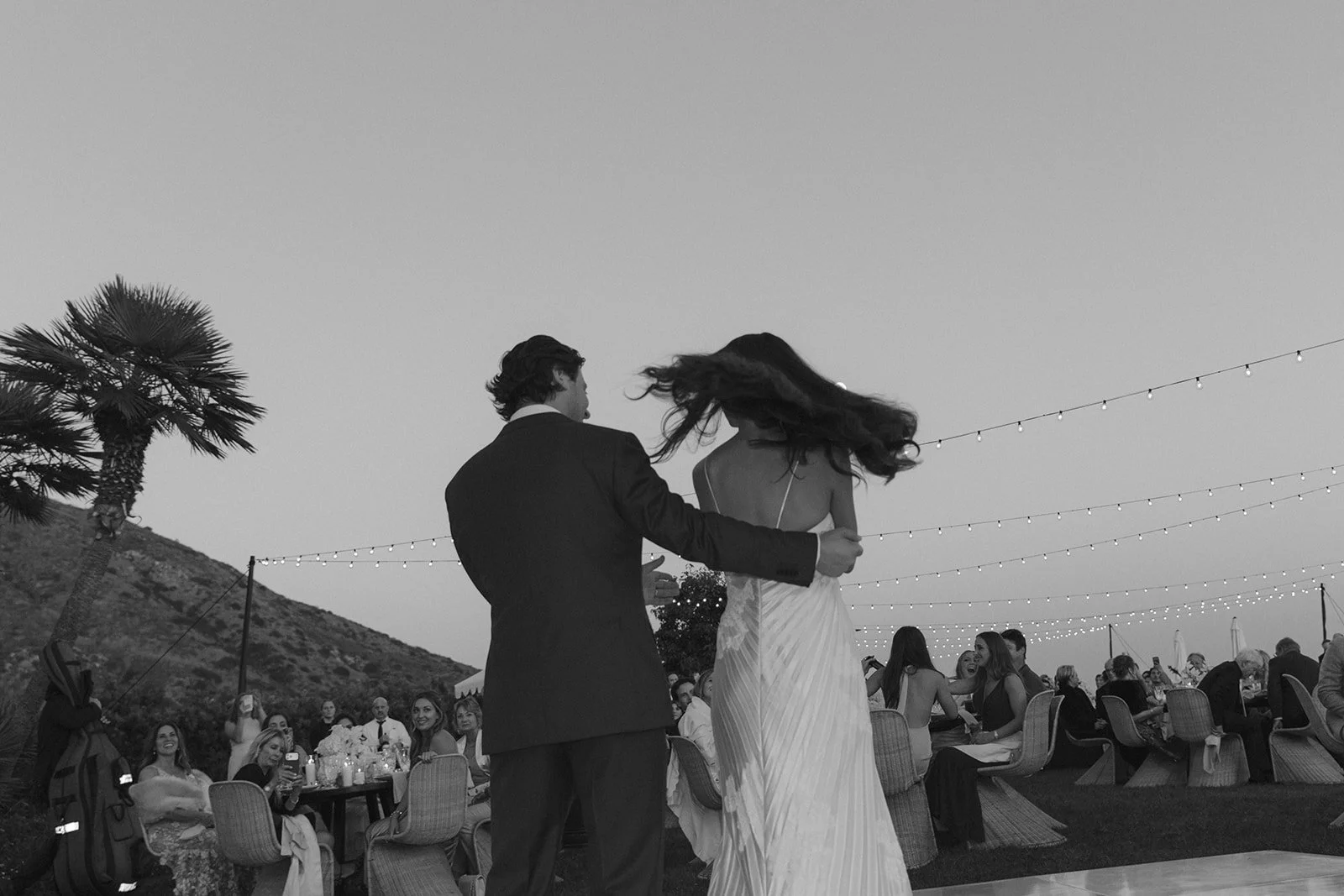 A bride and groom dancing at their wedding reception