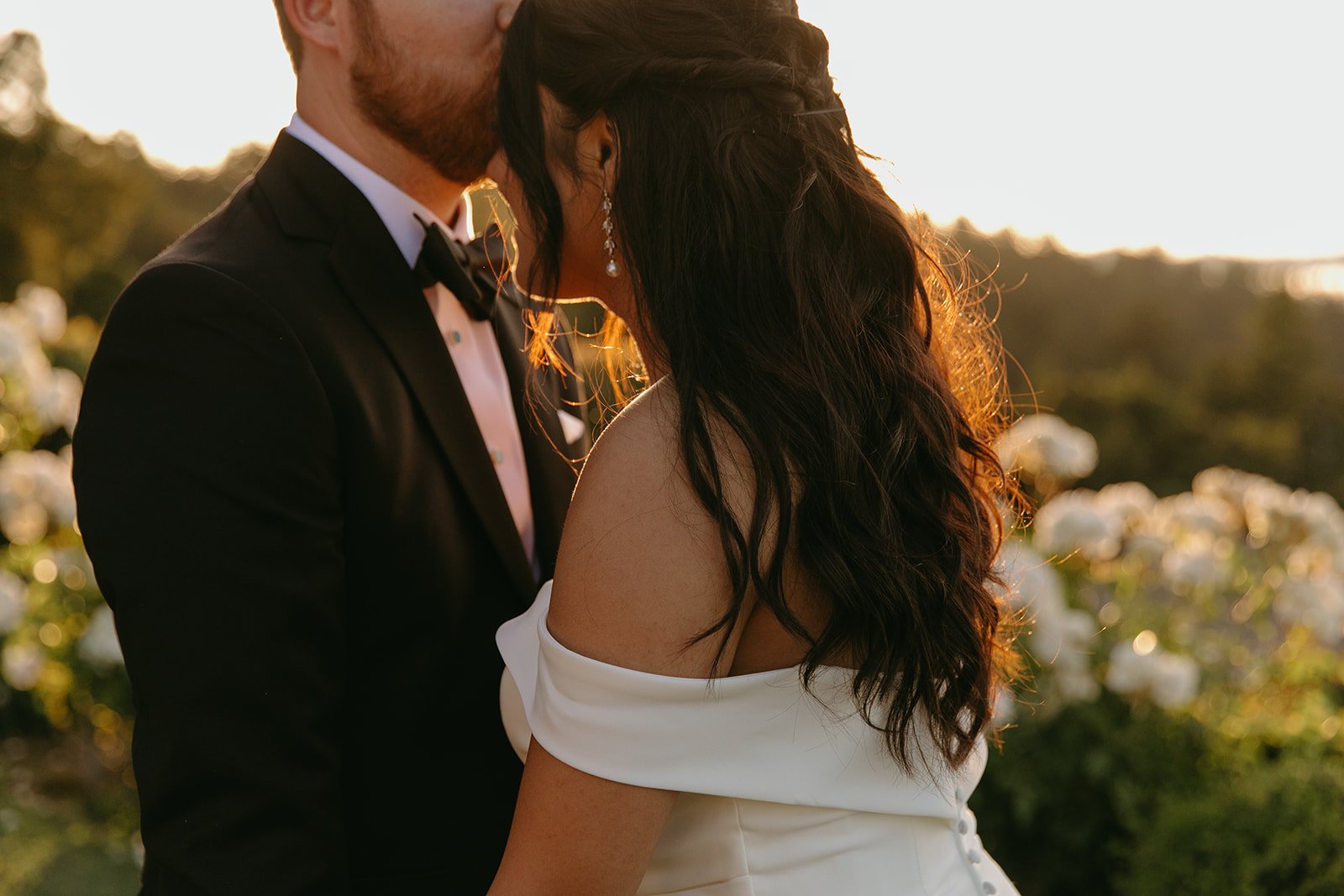 A bride and groom during sunset portraits