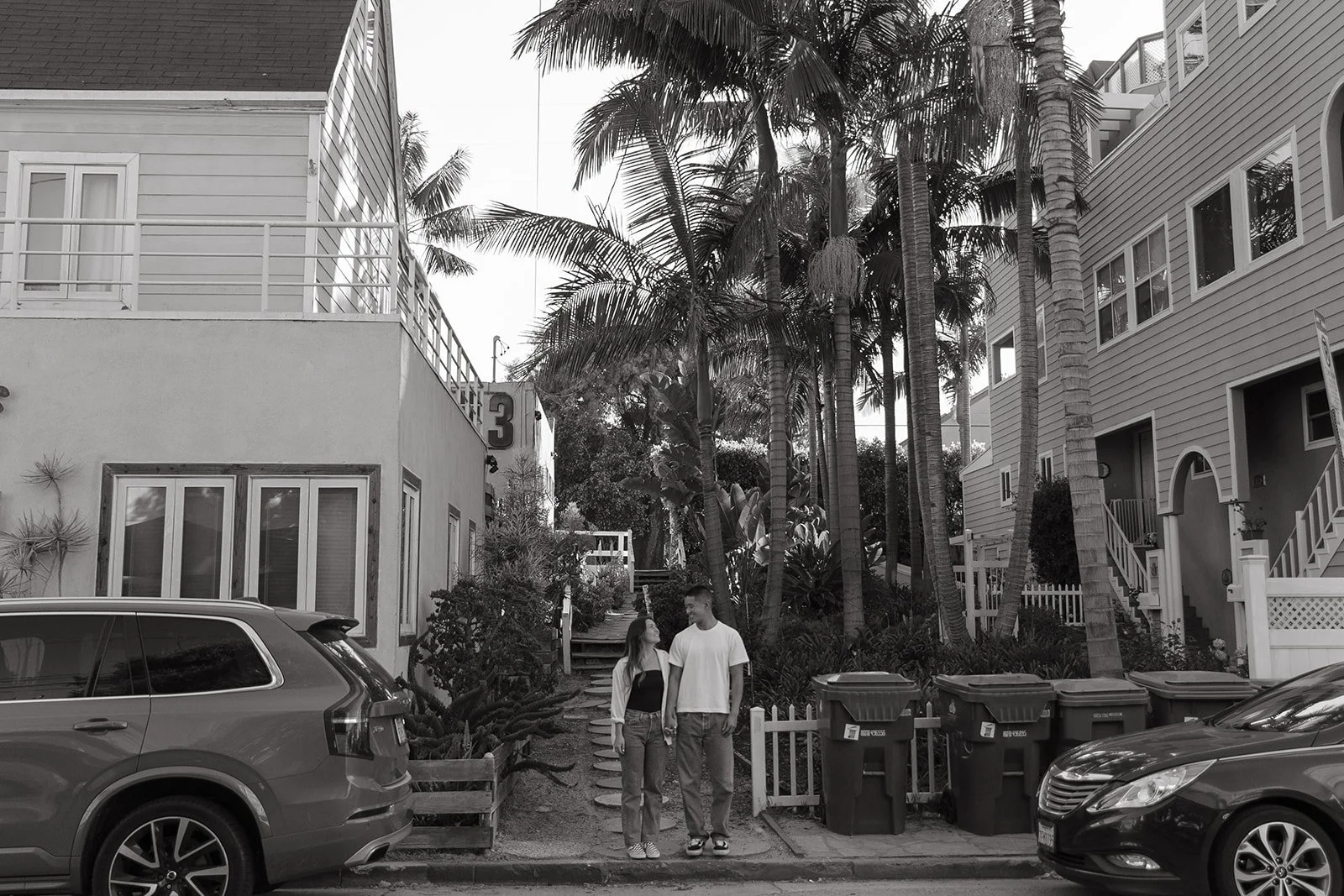 A quiet neighborhood moment captured at Venice Beach Photoshoot Locations with palm trees, coastal homes, and a relaxed street scene.